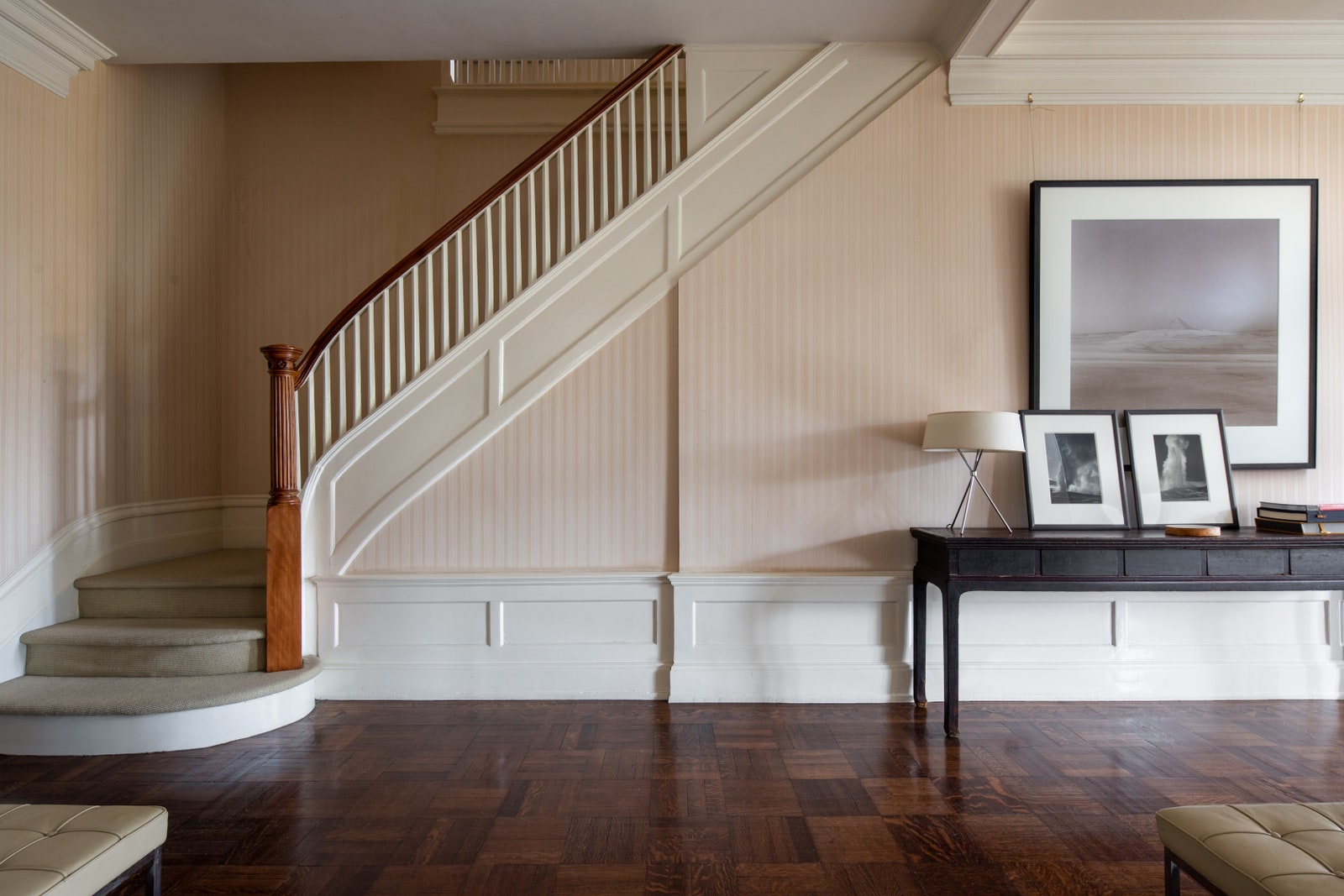 The unit is a duplex with an elegant front entryway.