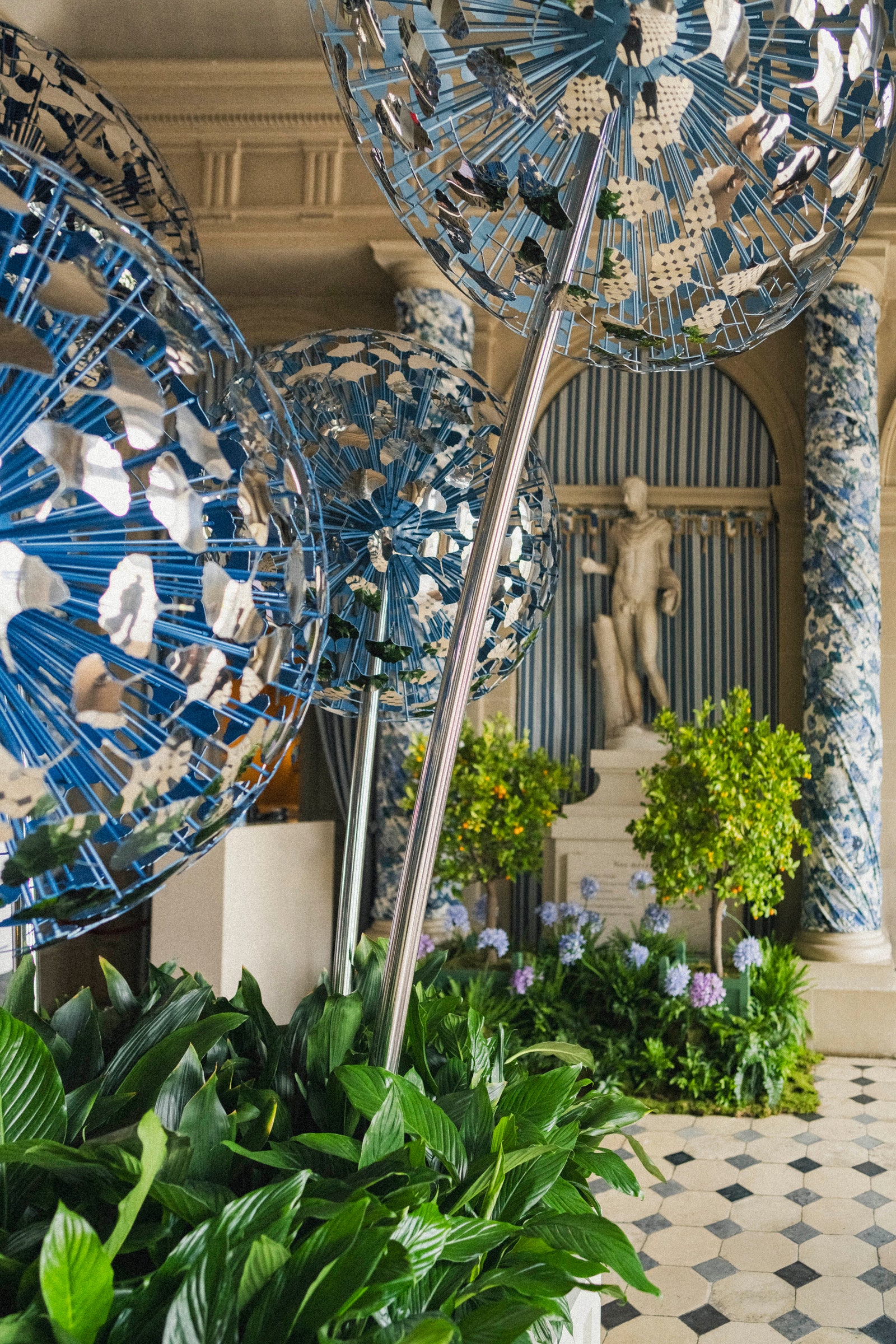 The entrance at Chateau VauxLeVicomte featuring steel sculptures by David Harber