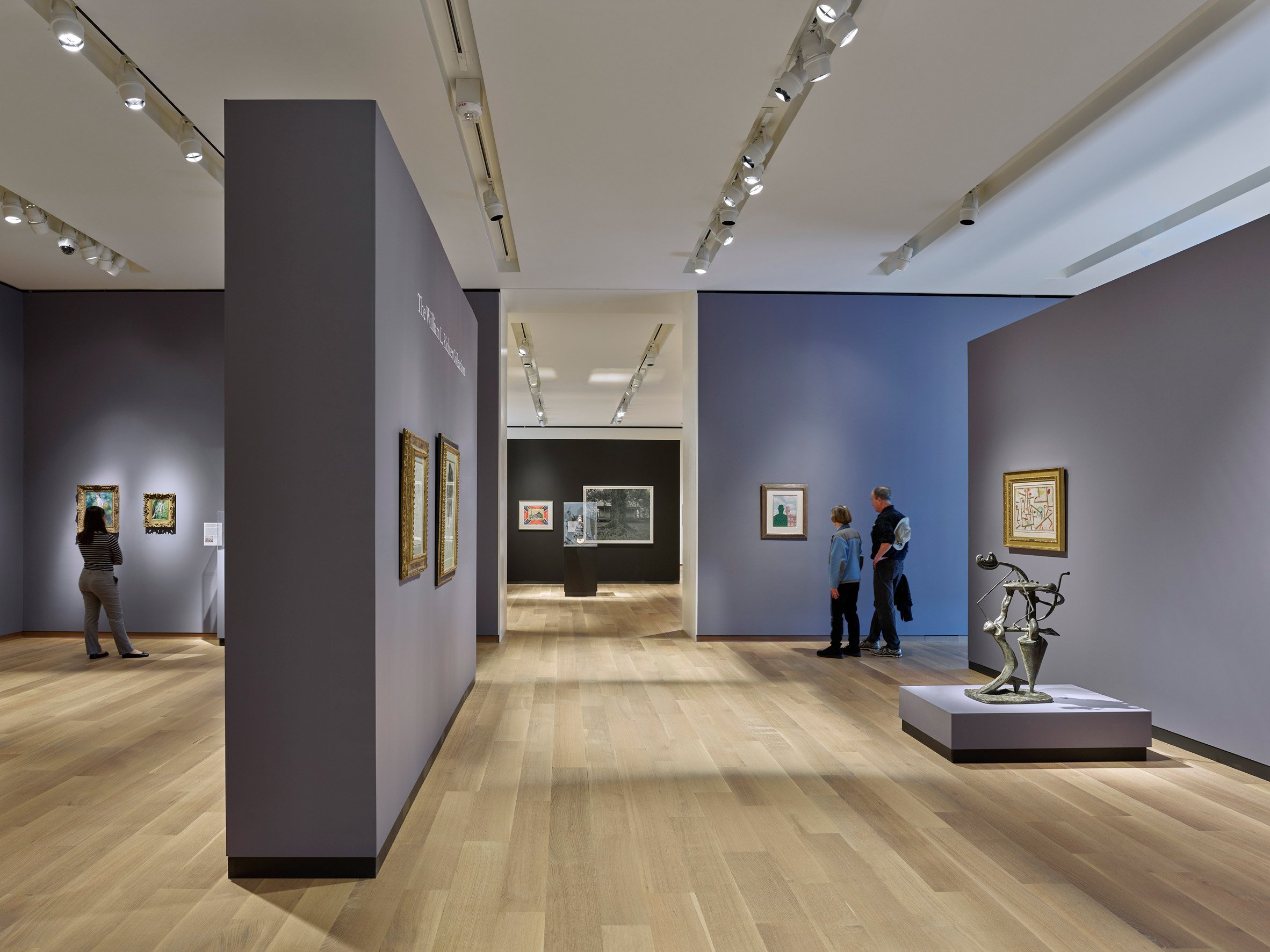 People looking at art in the Bruce museum in Connecticut