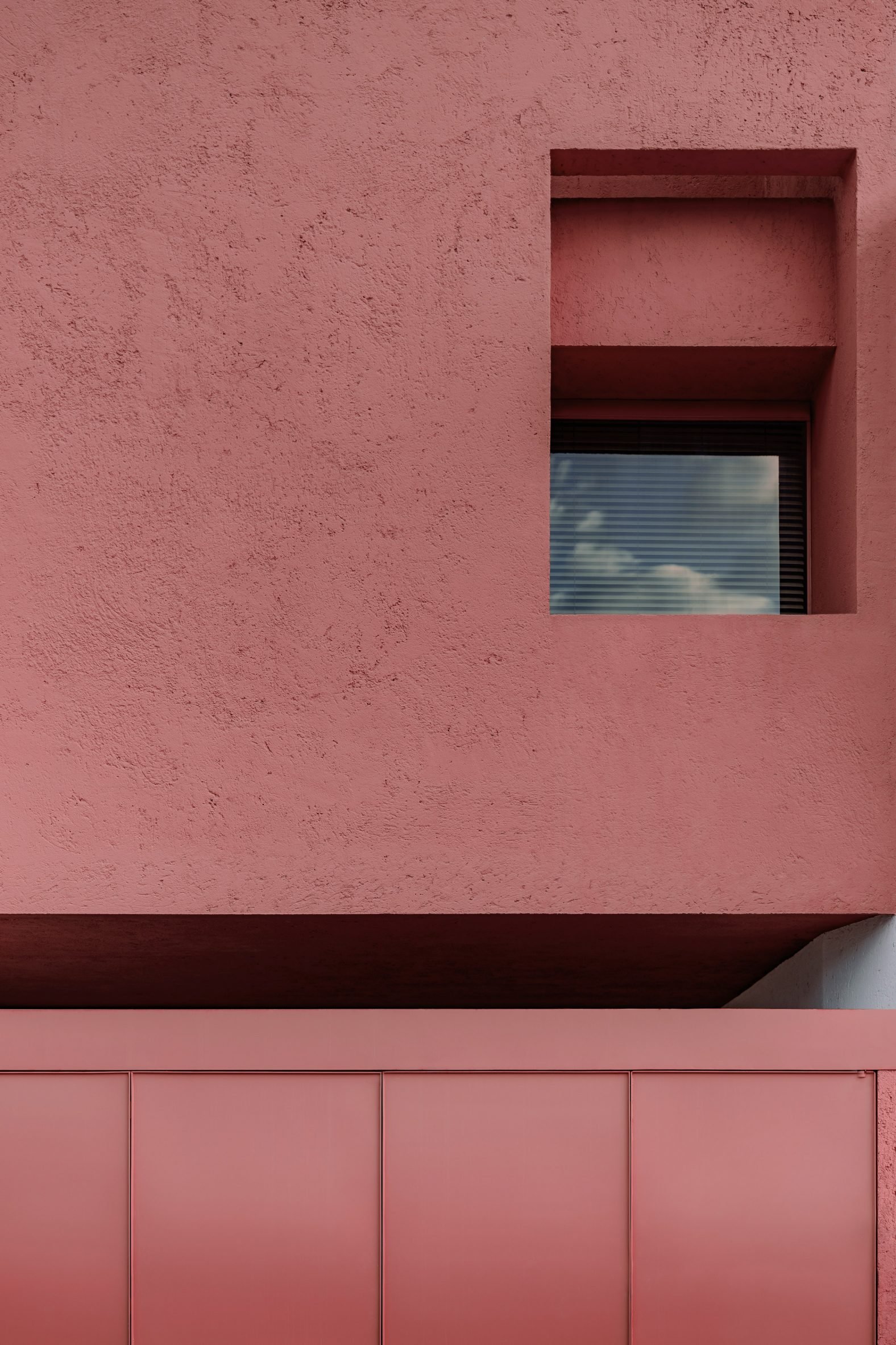 Close-up of front elevation with a single opening in the top right corner