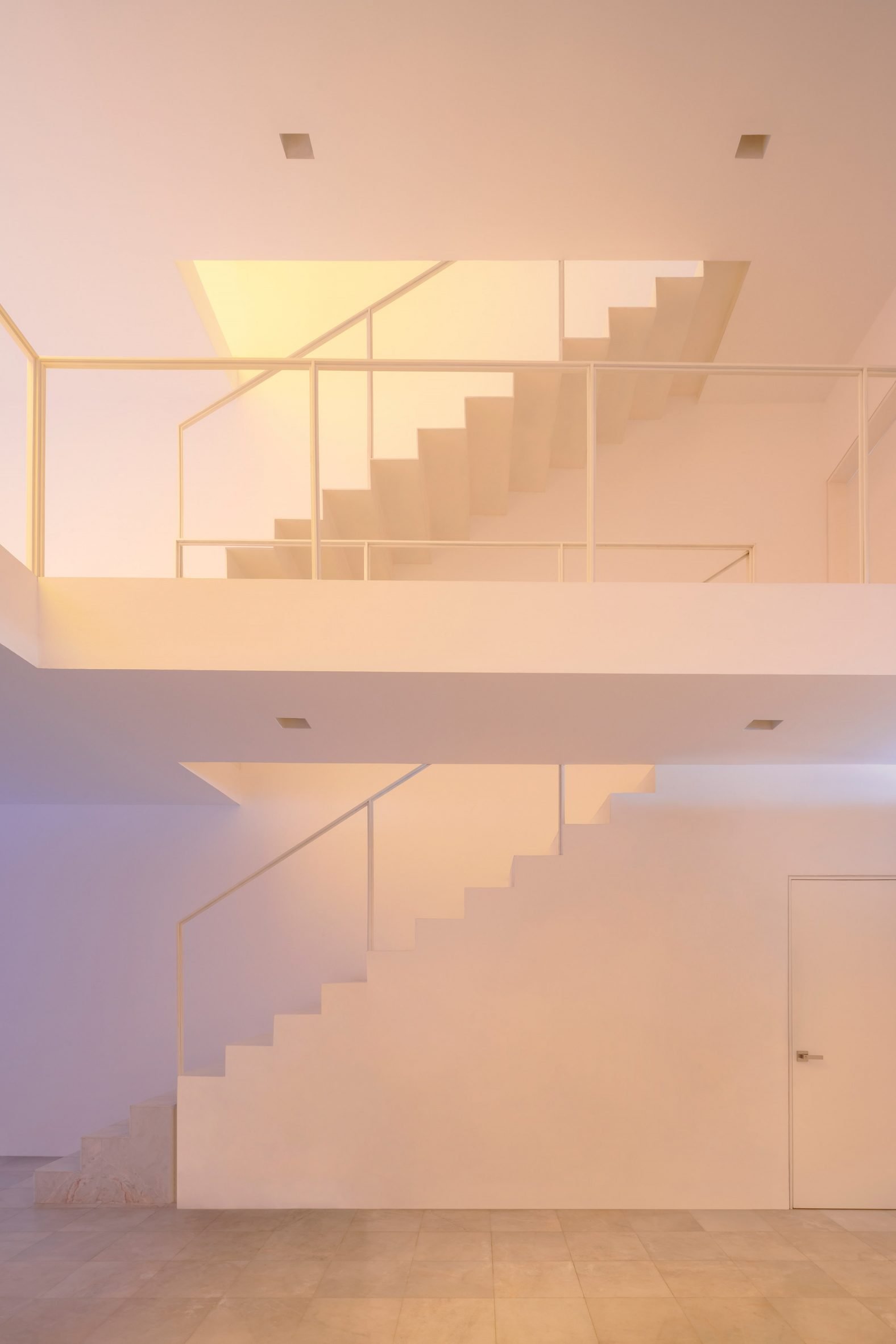 Two flights of staircases, above above the other