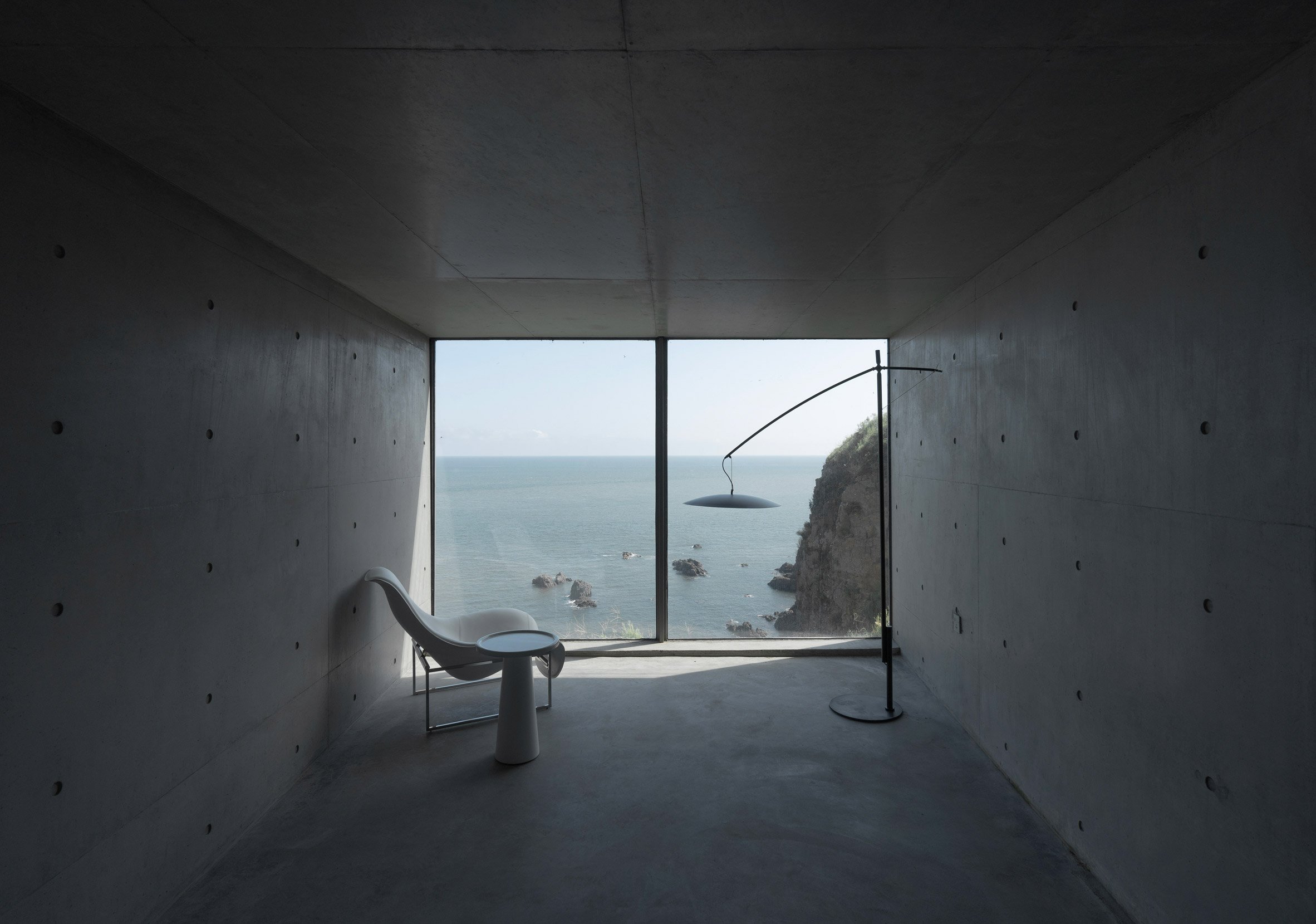 Concrete living space inside of Tower House