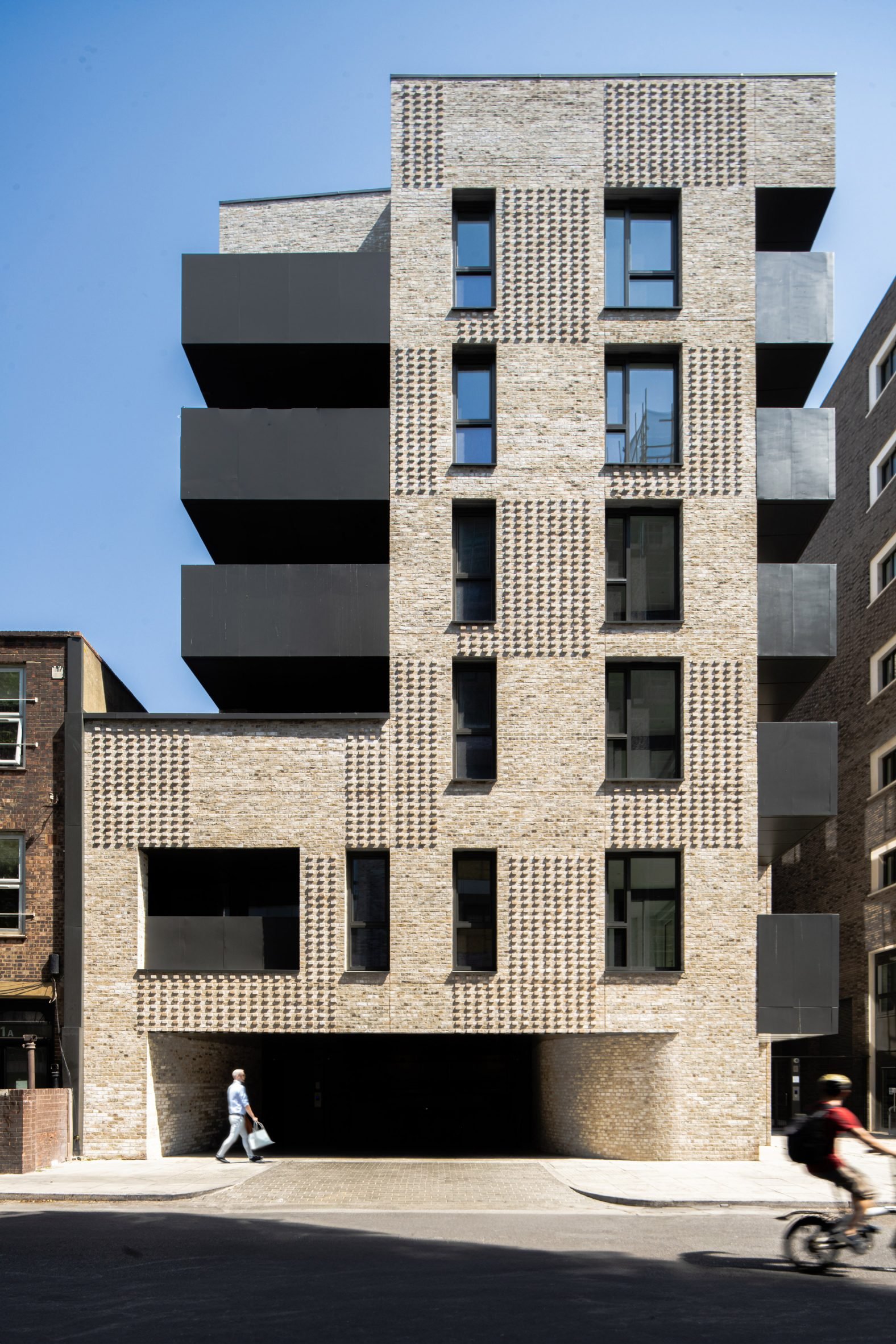 Brick housing and arts building by Coffey Architects