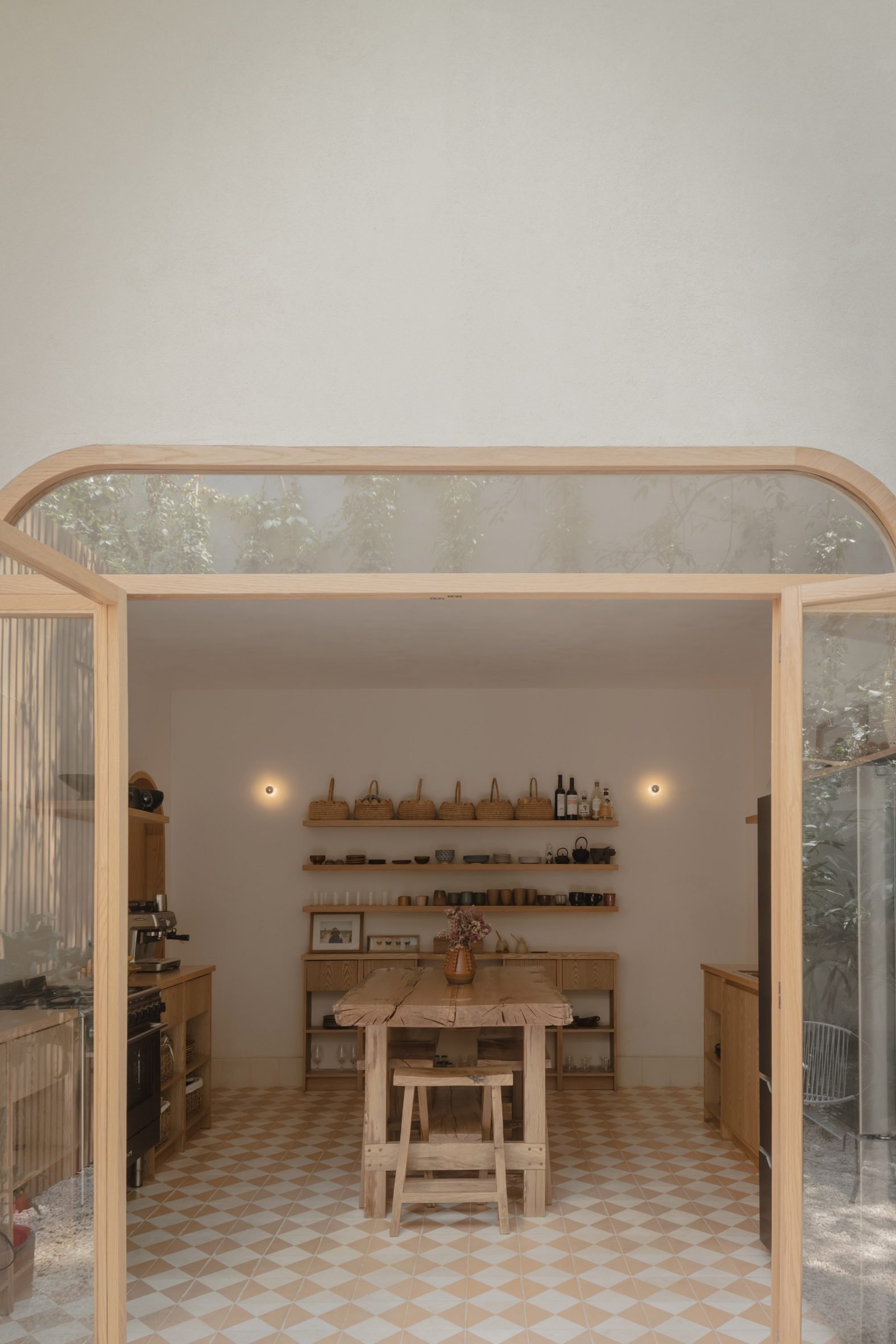 Kitchen entered via an arched doorway