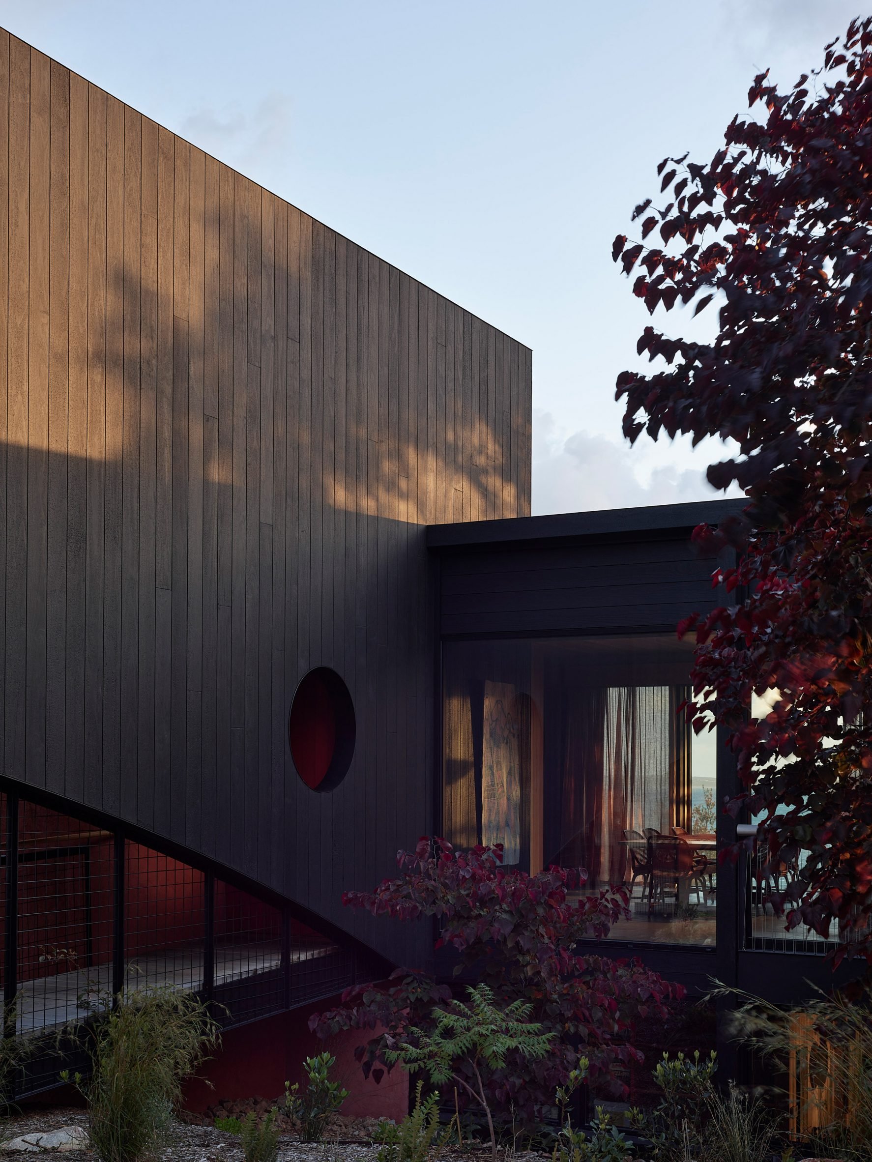 Charred timber exterior of Somers House by Kennedy Nolan