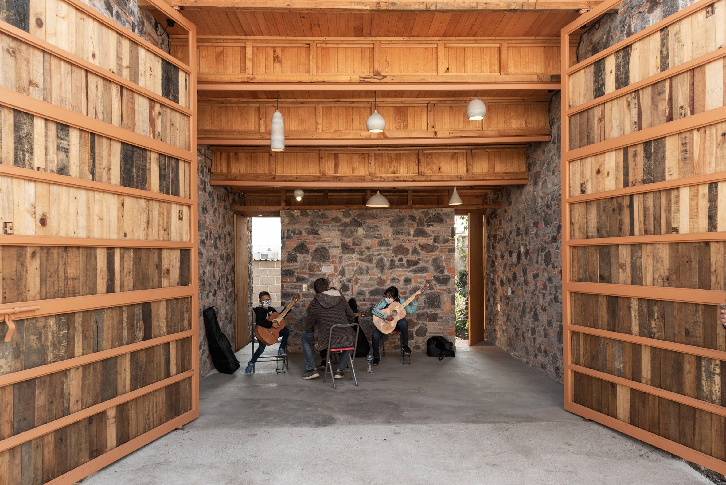 Hall with wooden ceiling and large doors