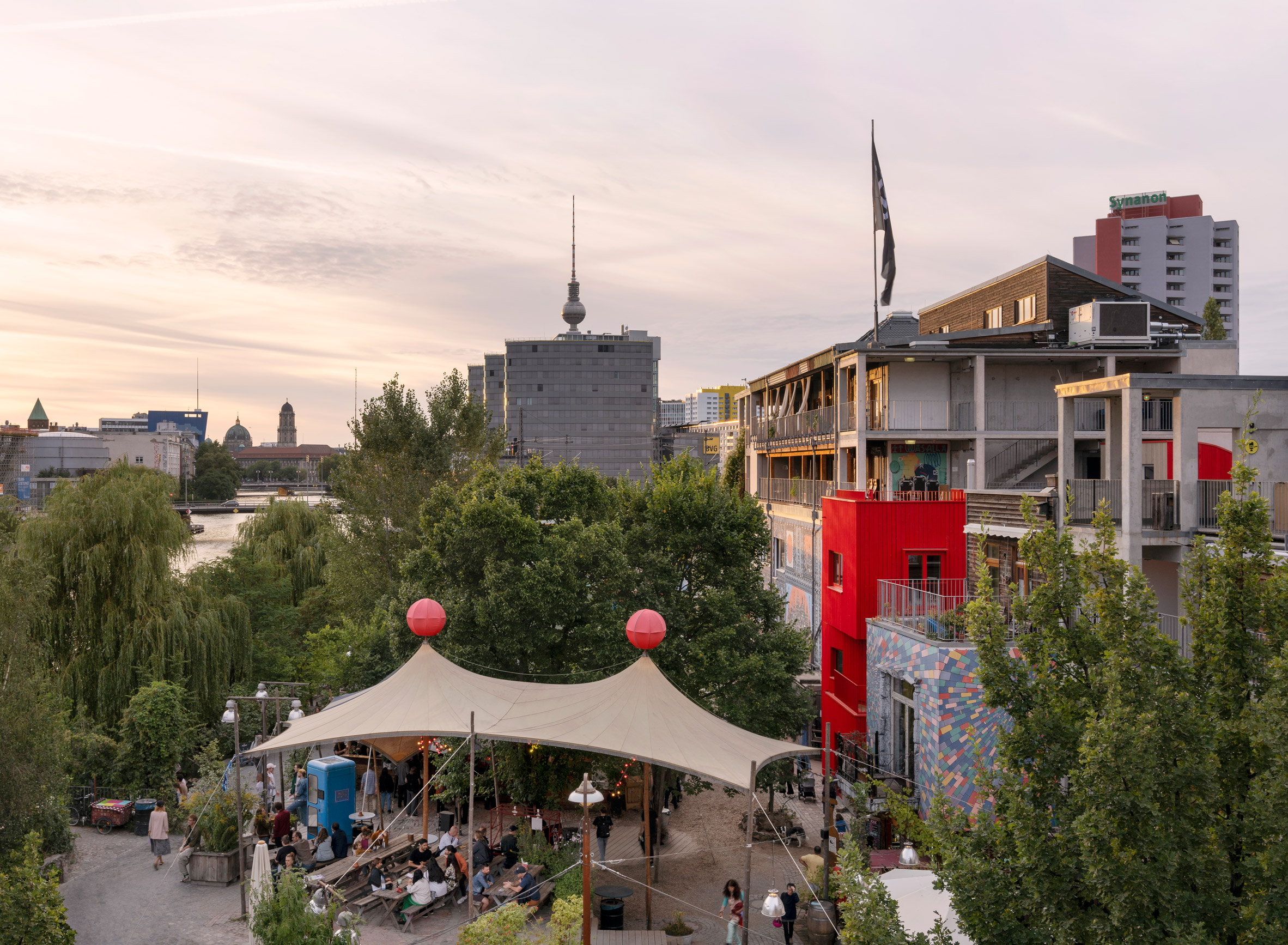 Red timber Haus 2+ office building by Office ParkScheerbarth