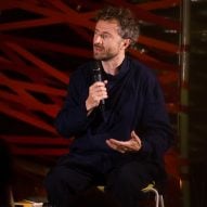 Thomas Heatherwick speaking into a microphone
