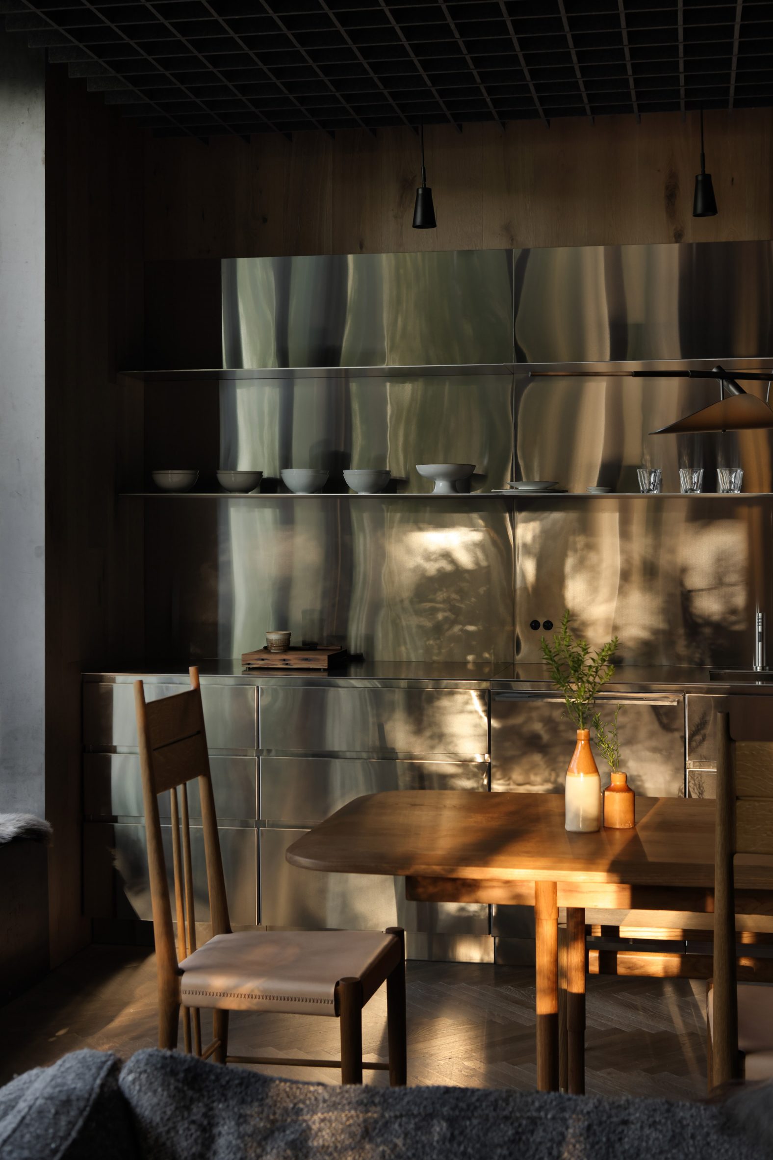 Stainless steel shelving in kitchen