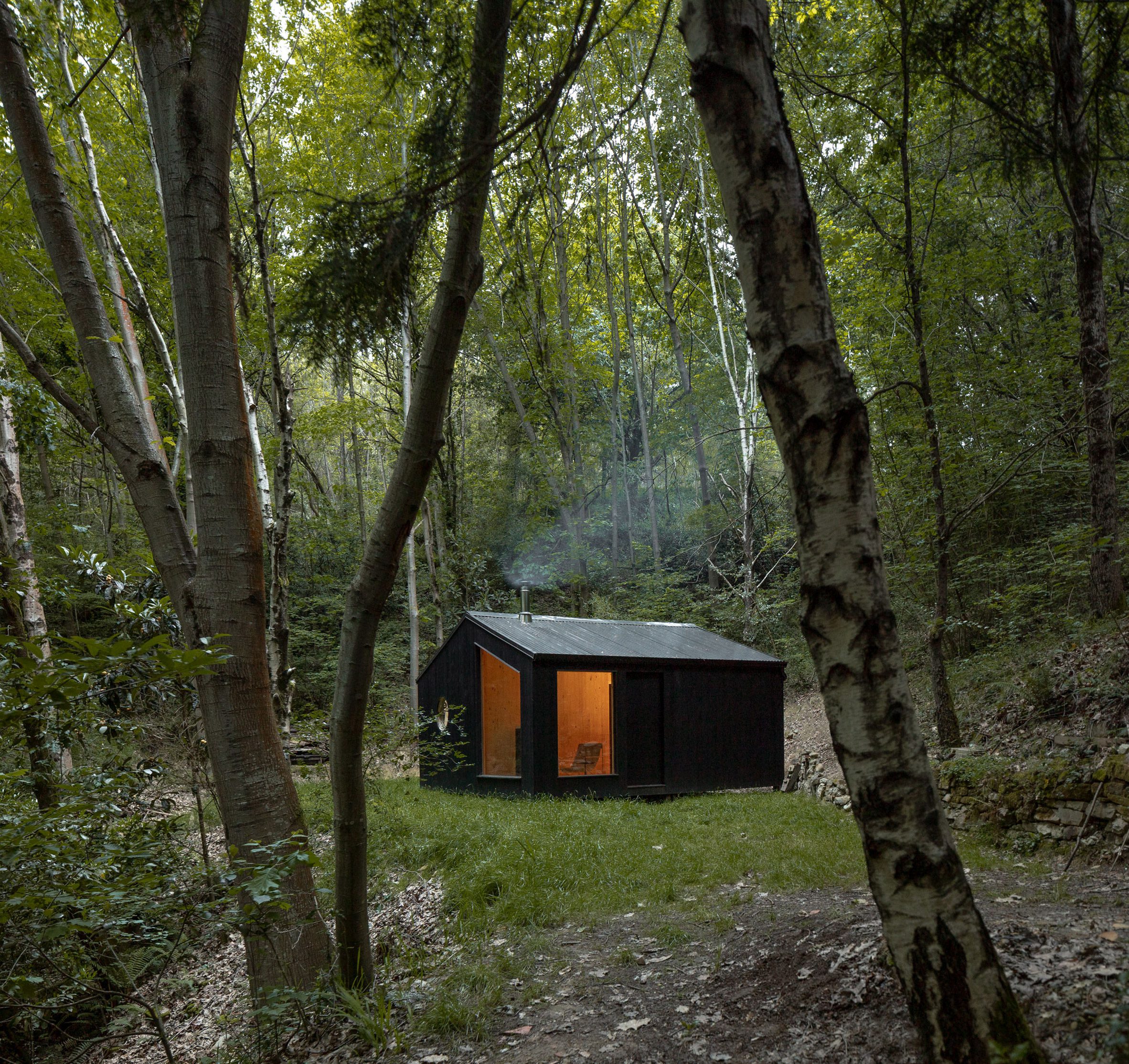 Wooden cabin in woodland