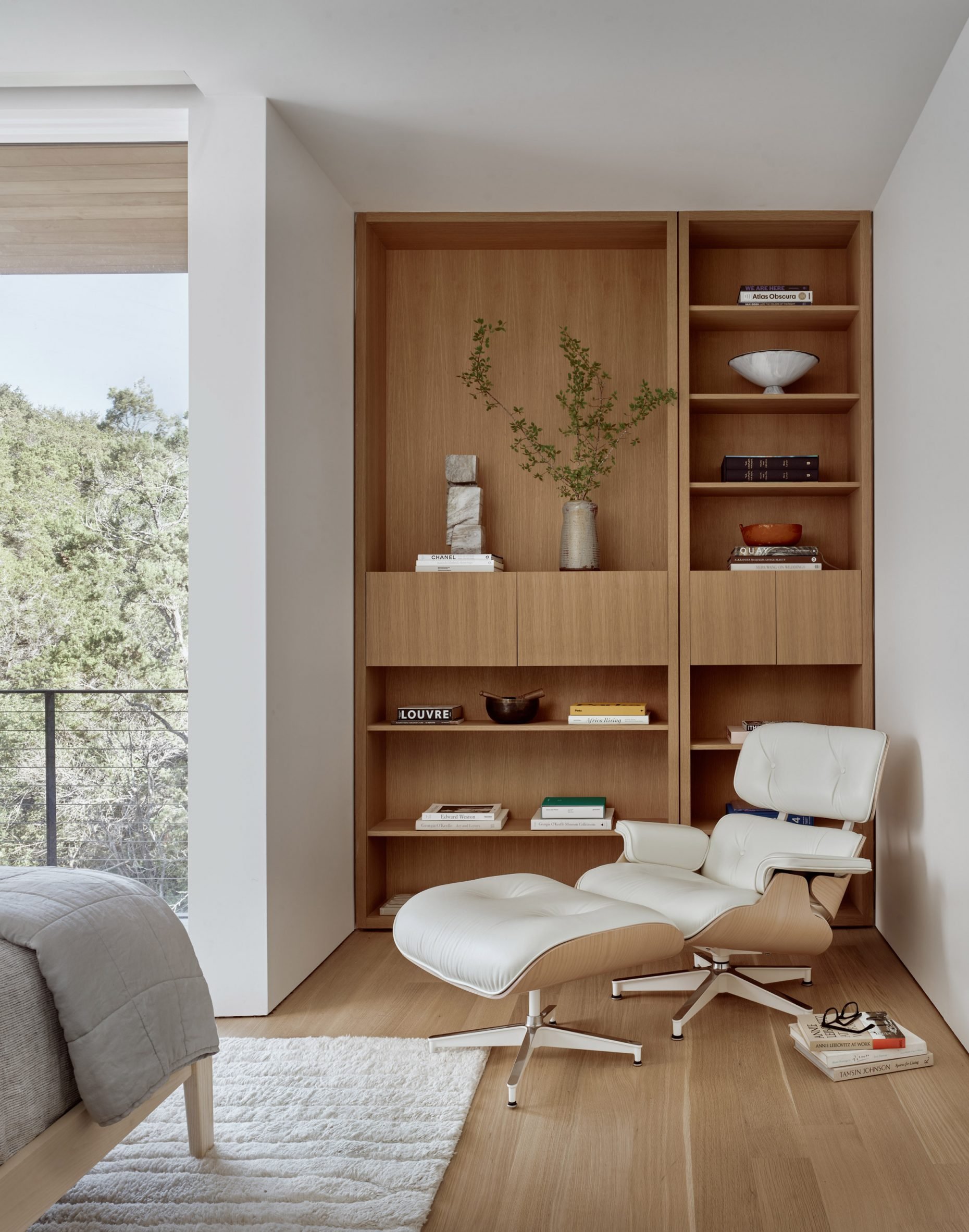 master bedroom with light colored furnishings