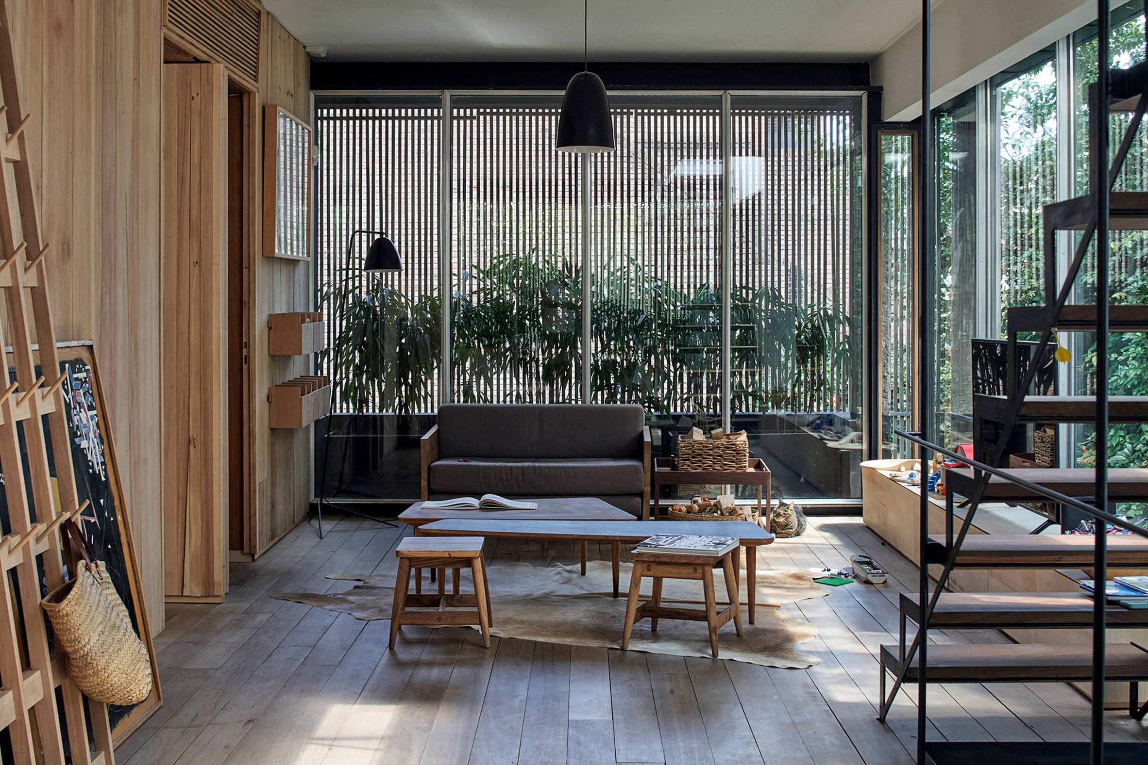 Suspended staircase with open wooden treads