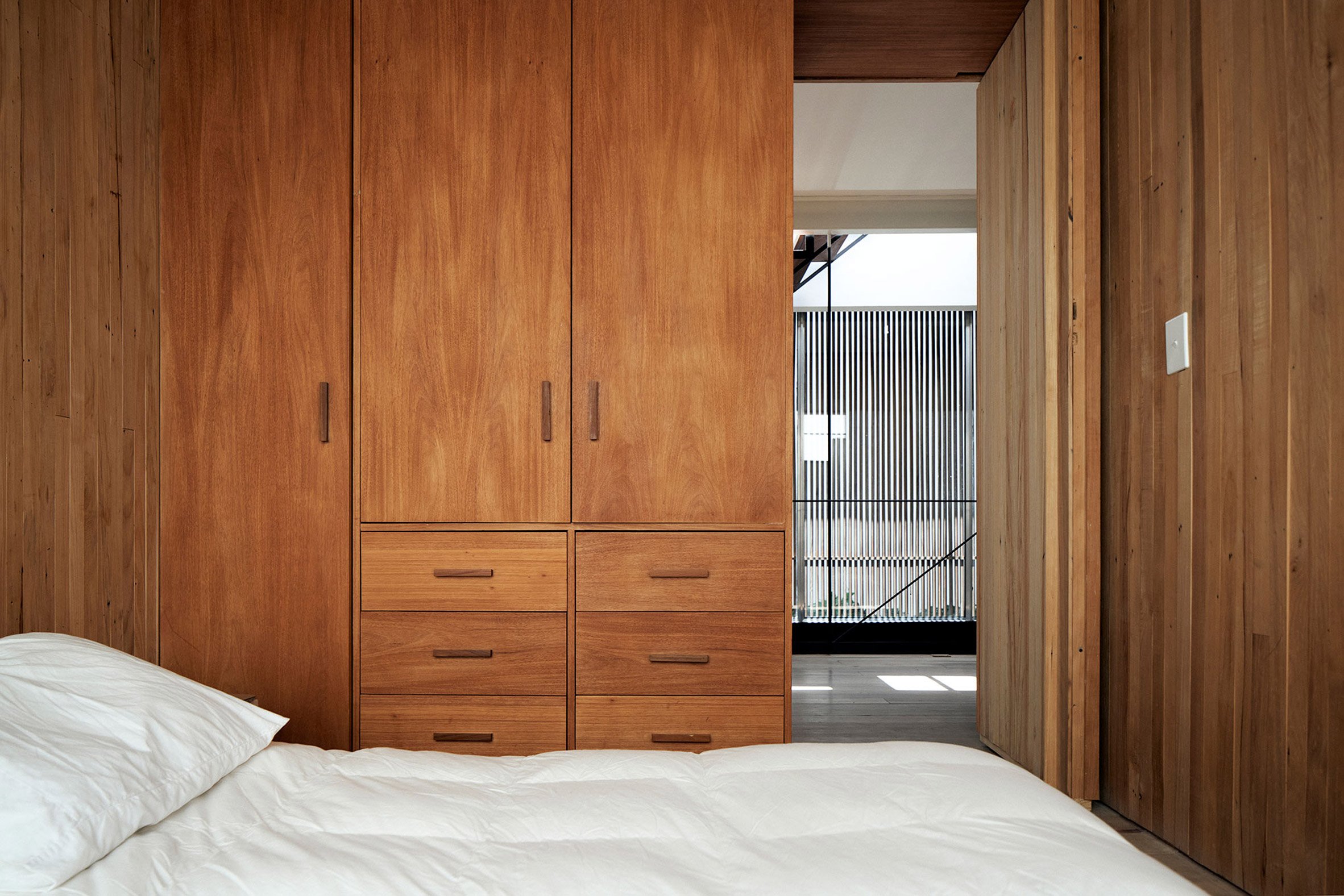 Wood-clad bedroom