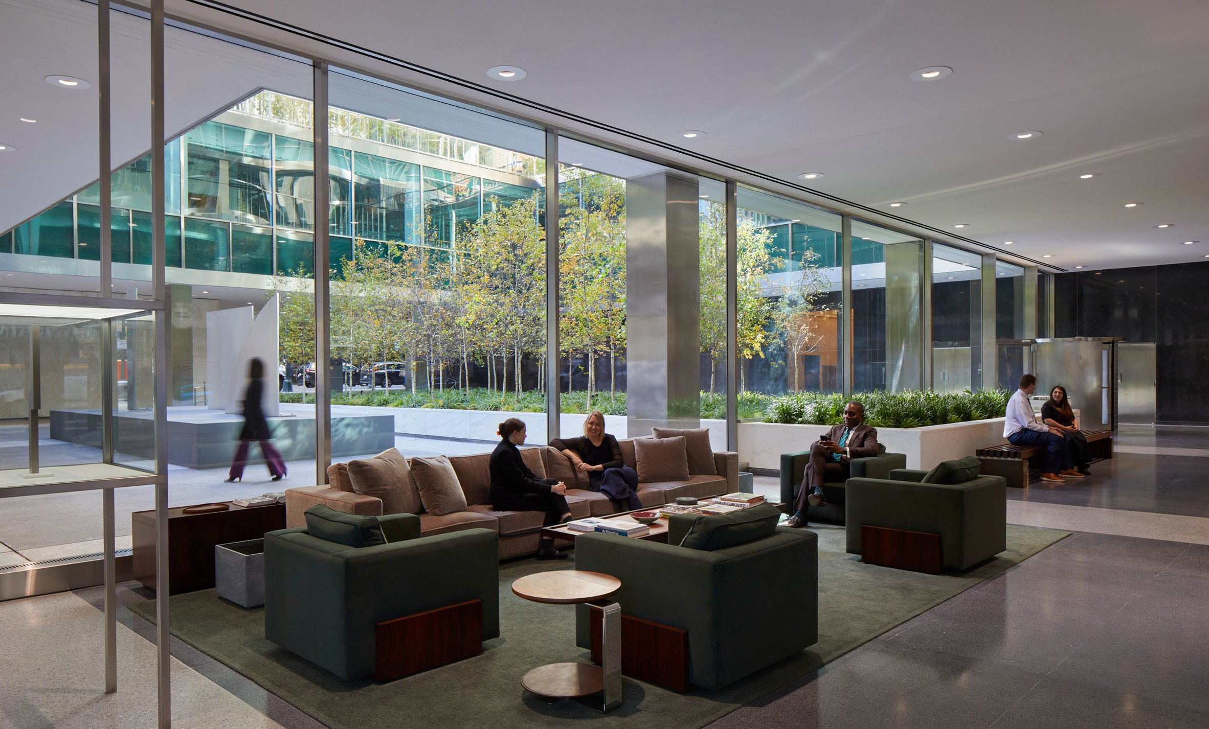 A lobby building with velvet furniture