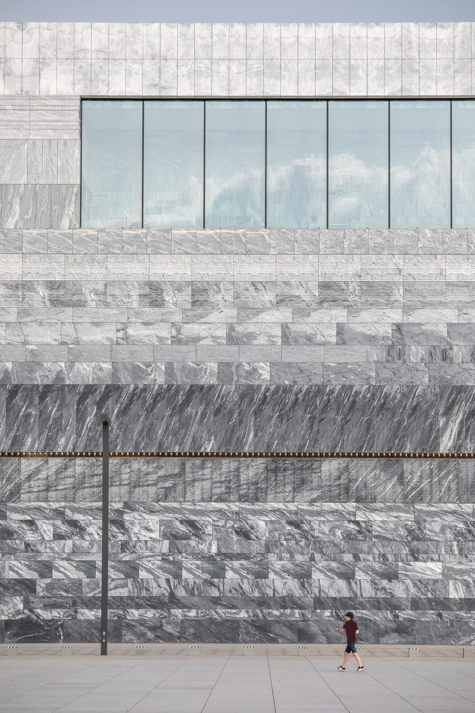 Grey marble wall at the Polish History Museum by WXCA
