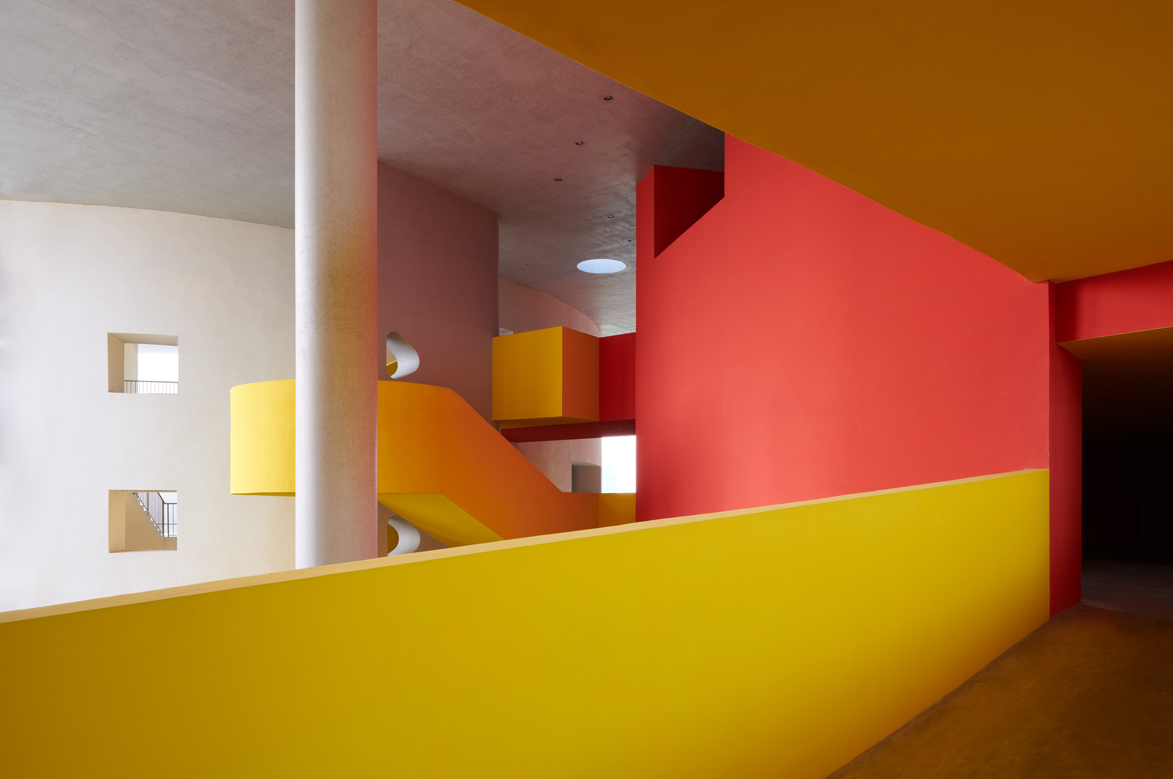 Exterior and interior pathways at Haikou Jiangdong Huandao Experimental School