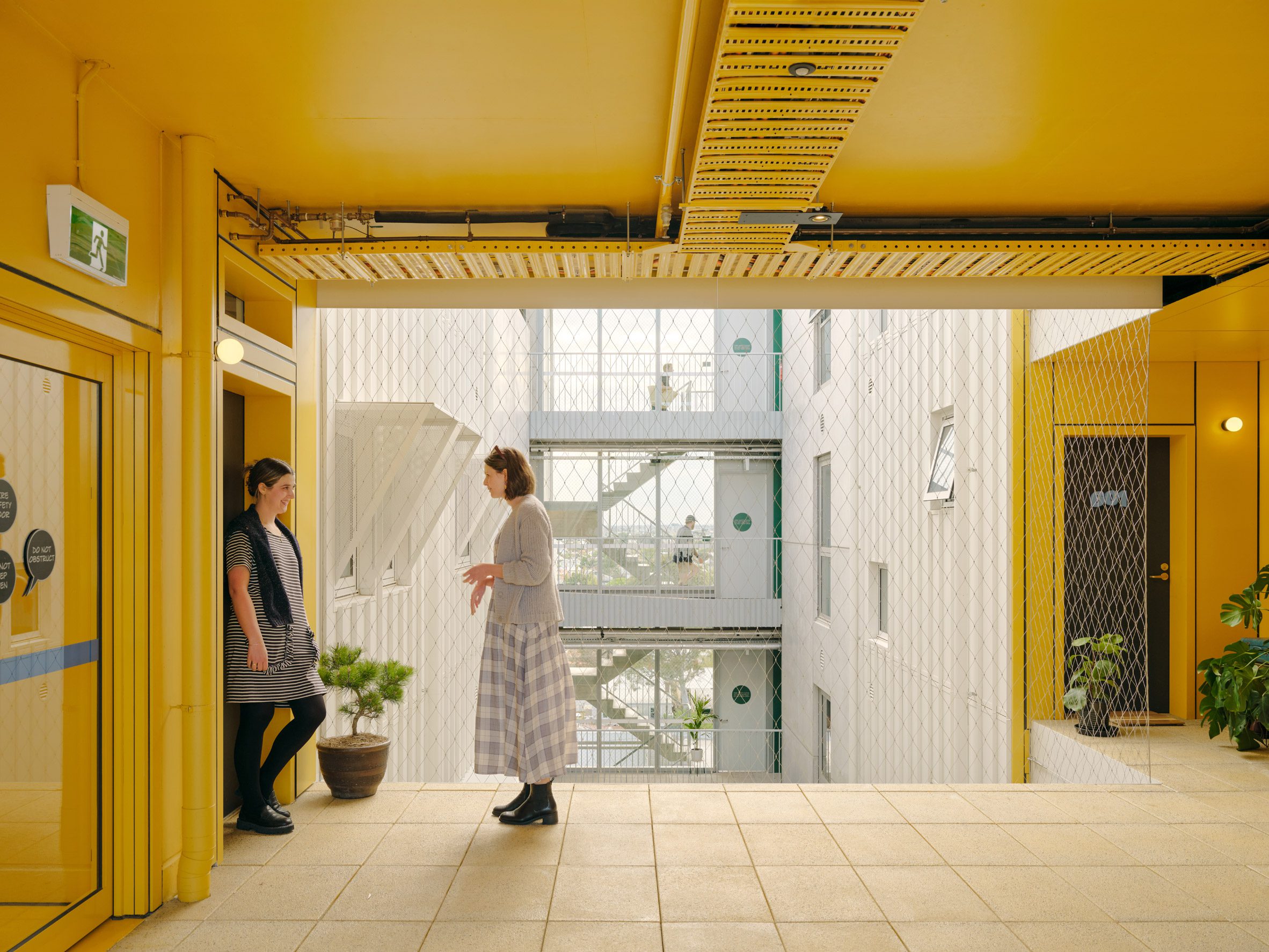 Communal walkways of ParkLife apartment block in Melbourne by Austin Maynard Architects