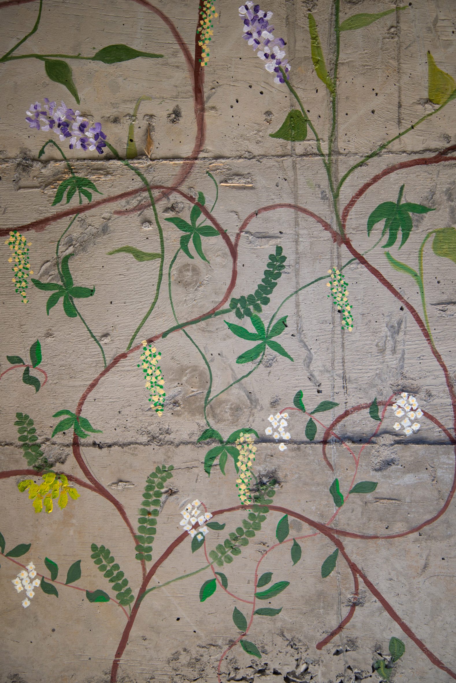 Painted flowers on concrete