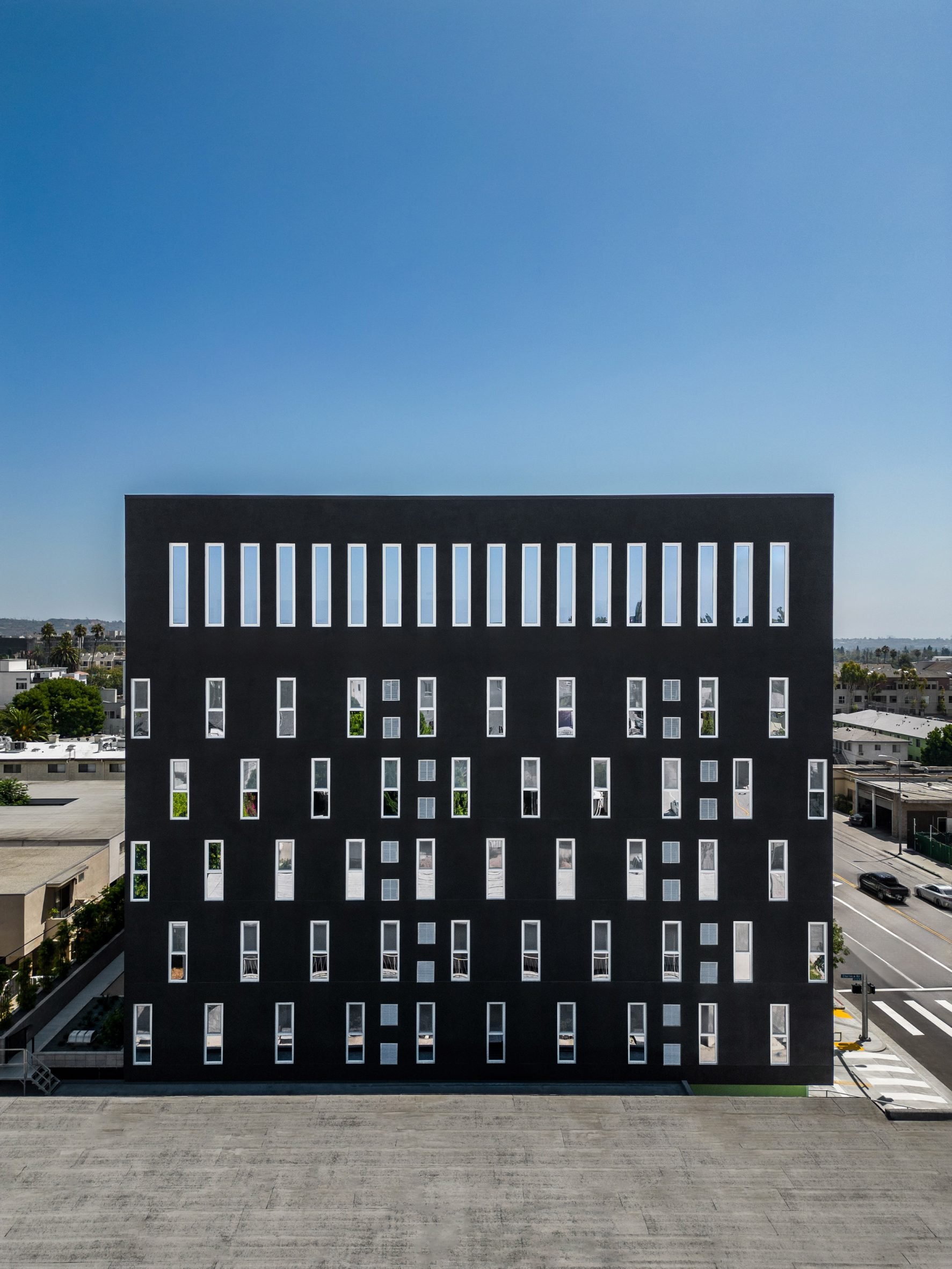 Black building with many skinny windows