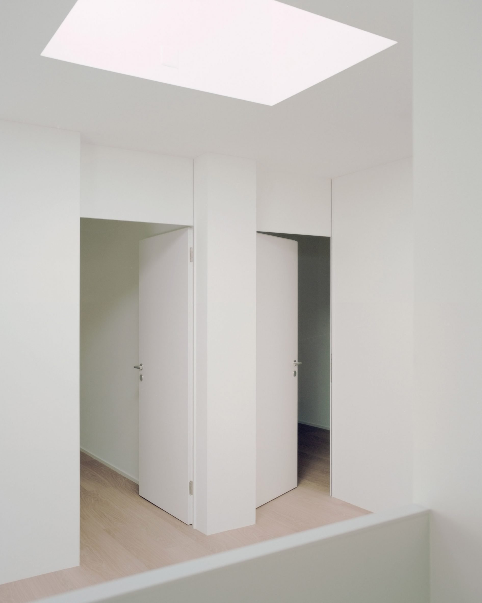 Internal skylight of the concrete terrace houses in Switzerland by Atelier Rampazzi