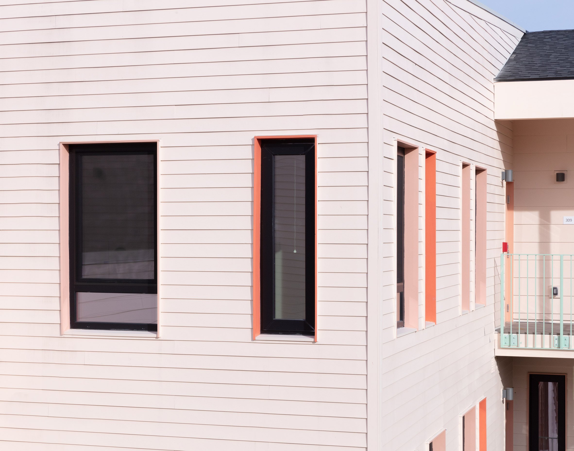 Pink cladding on cohousing