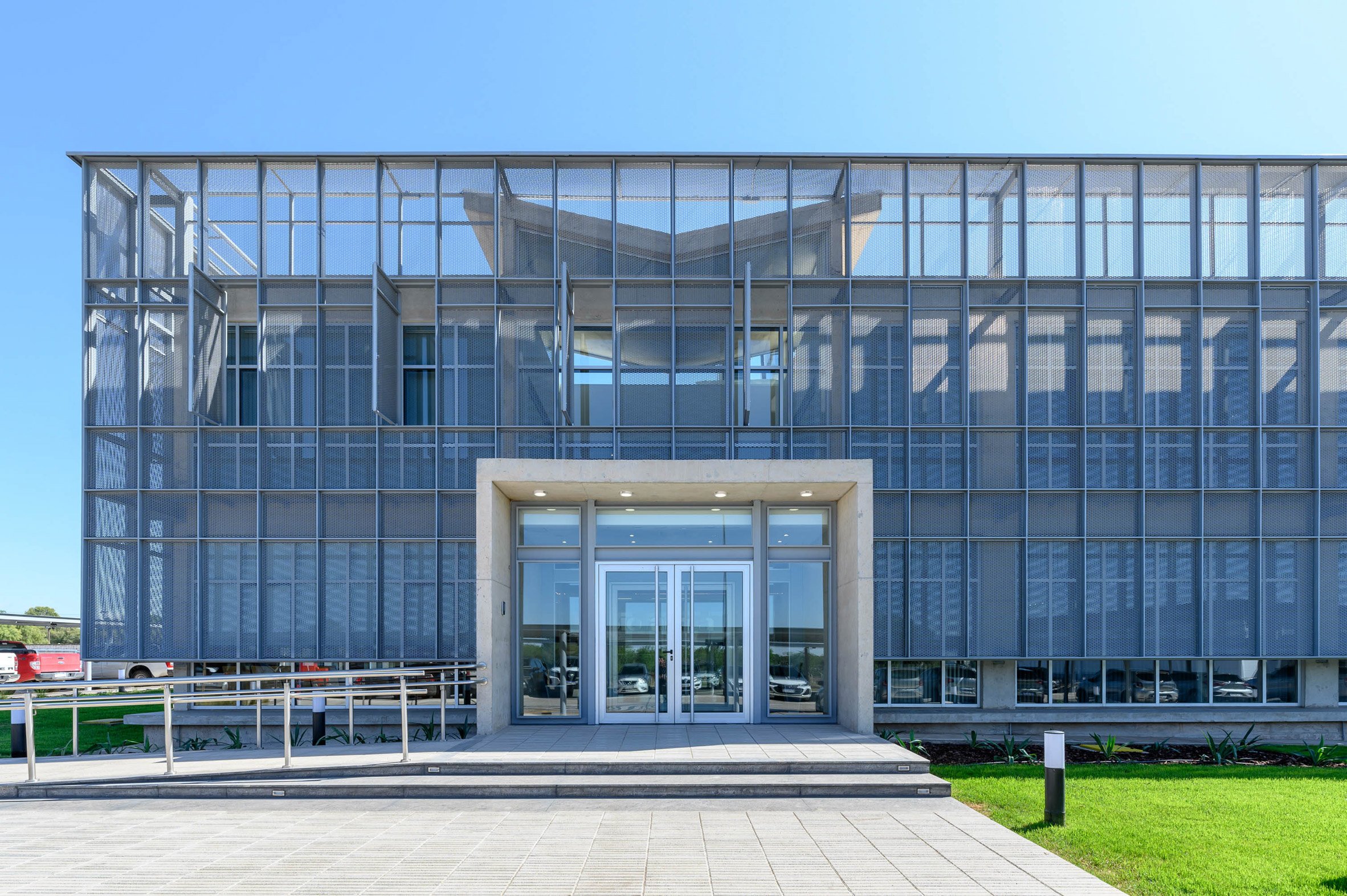 The front doors on a facade of an industrial building