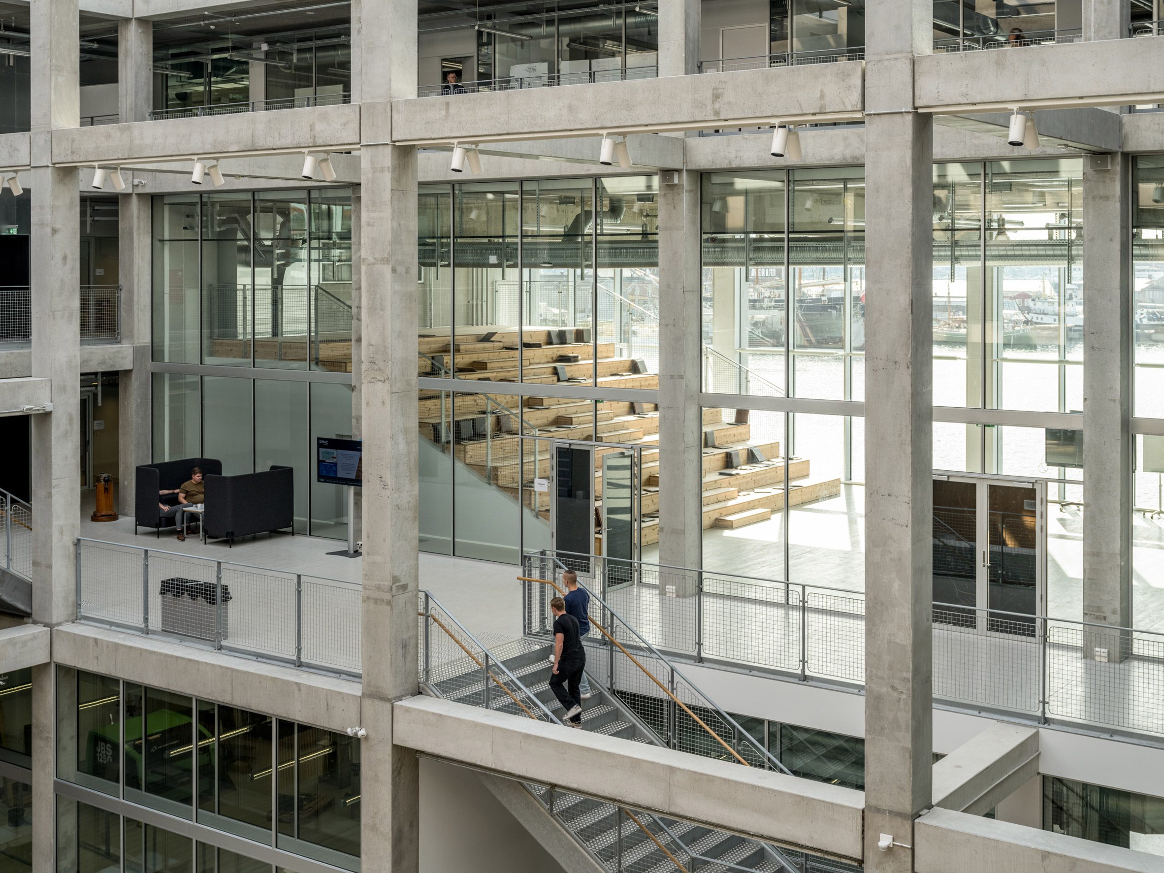Stairs and frame of concrete maritime academy in Denmark by EFFEKT and CF Moller Architects