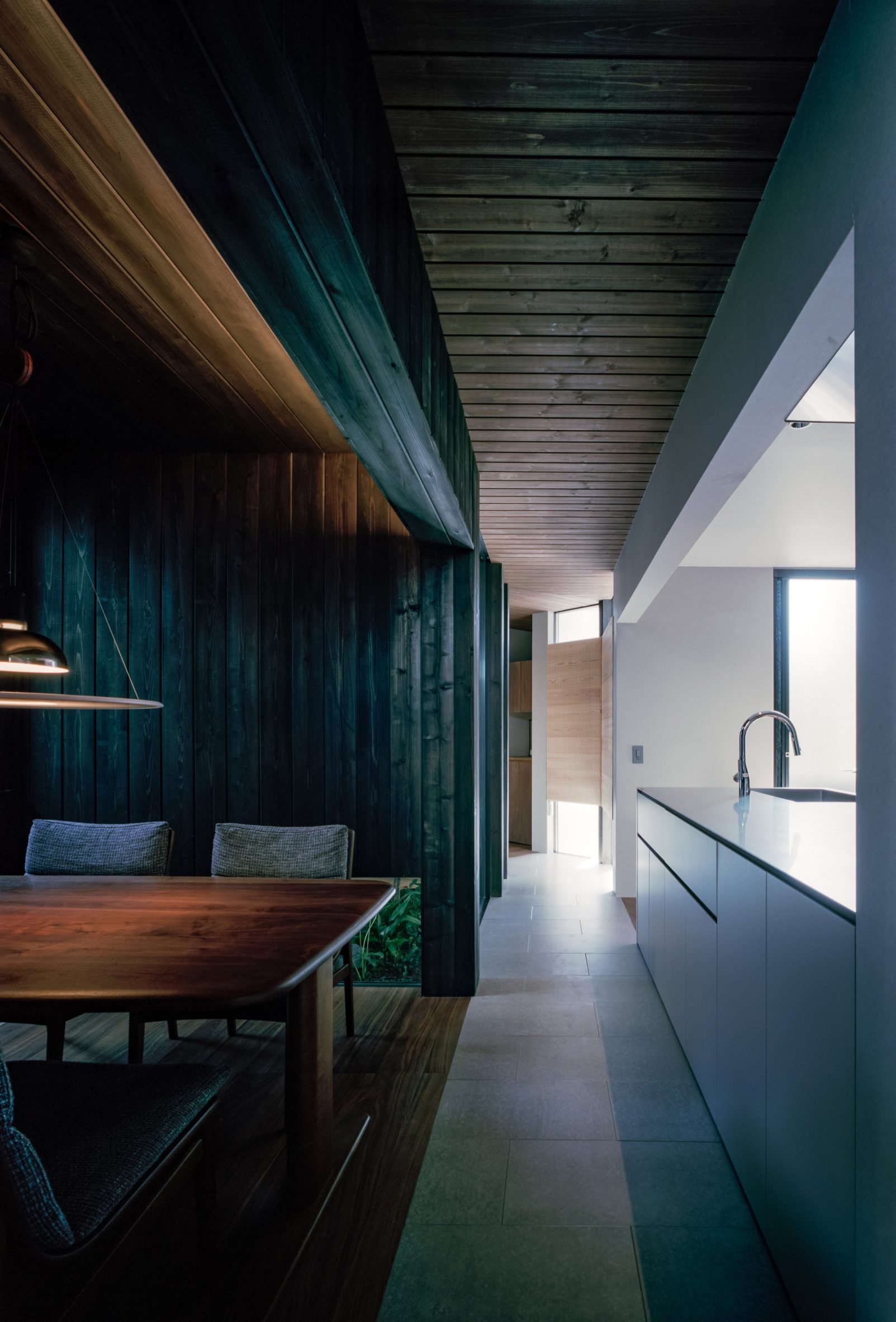 Kitchen and dining spaces within Osaka home