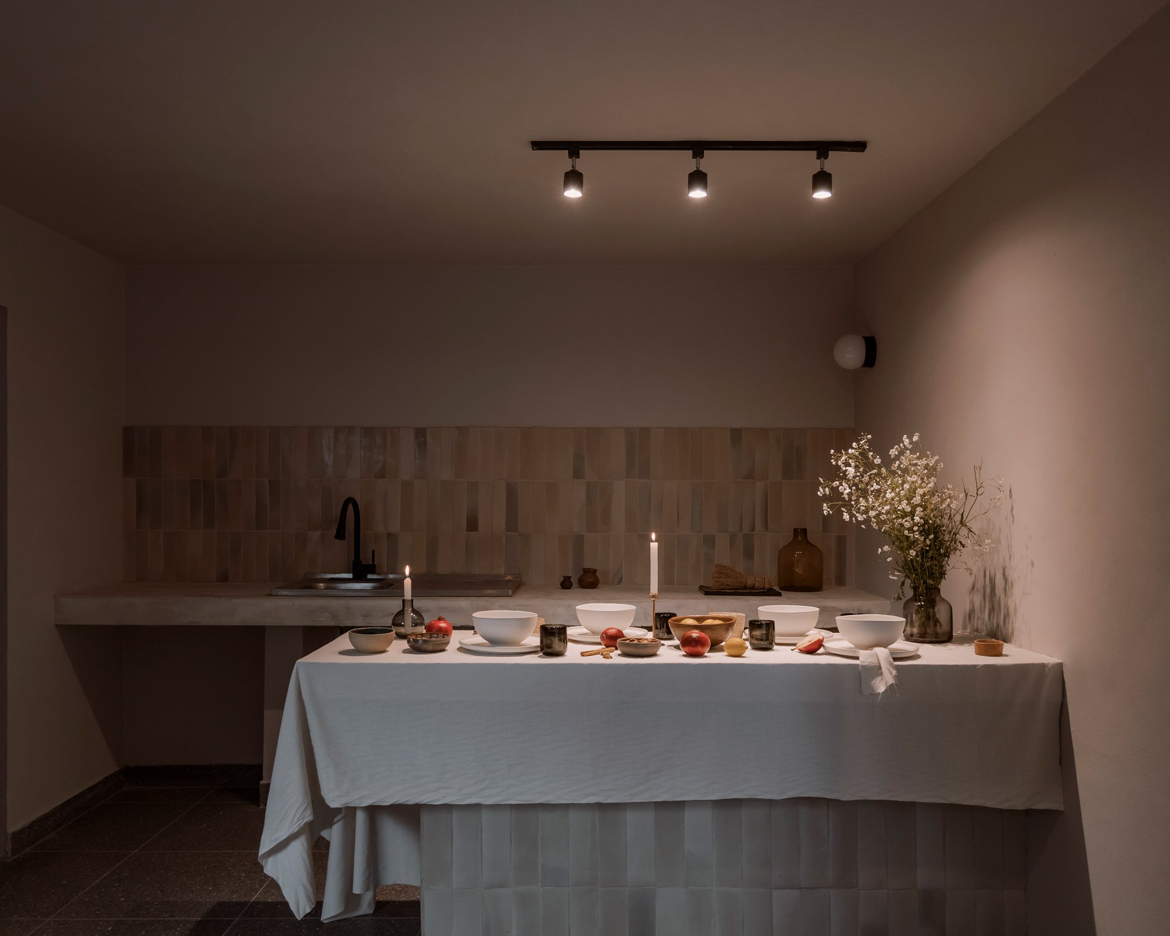 Kitchen with multi-coloured ceramic tiles