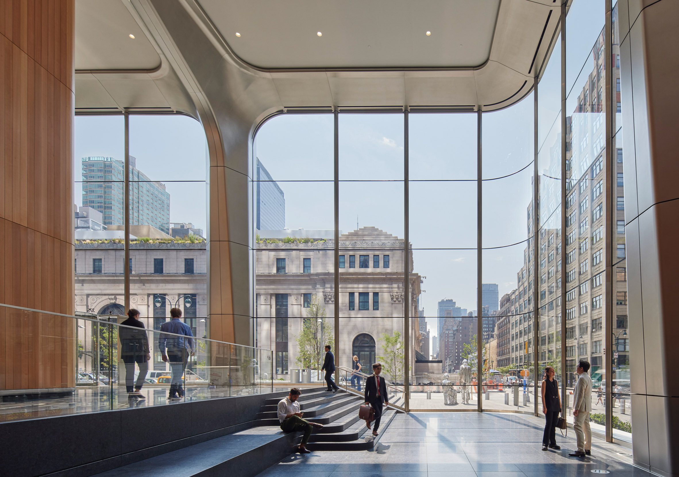 A lobby with curved glass corners