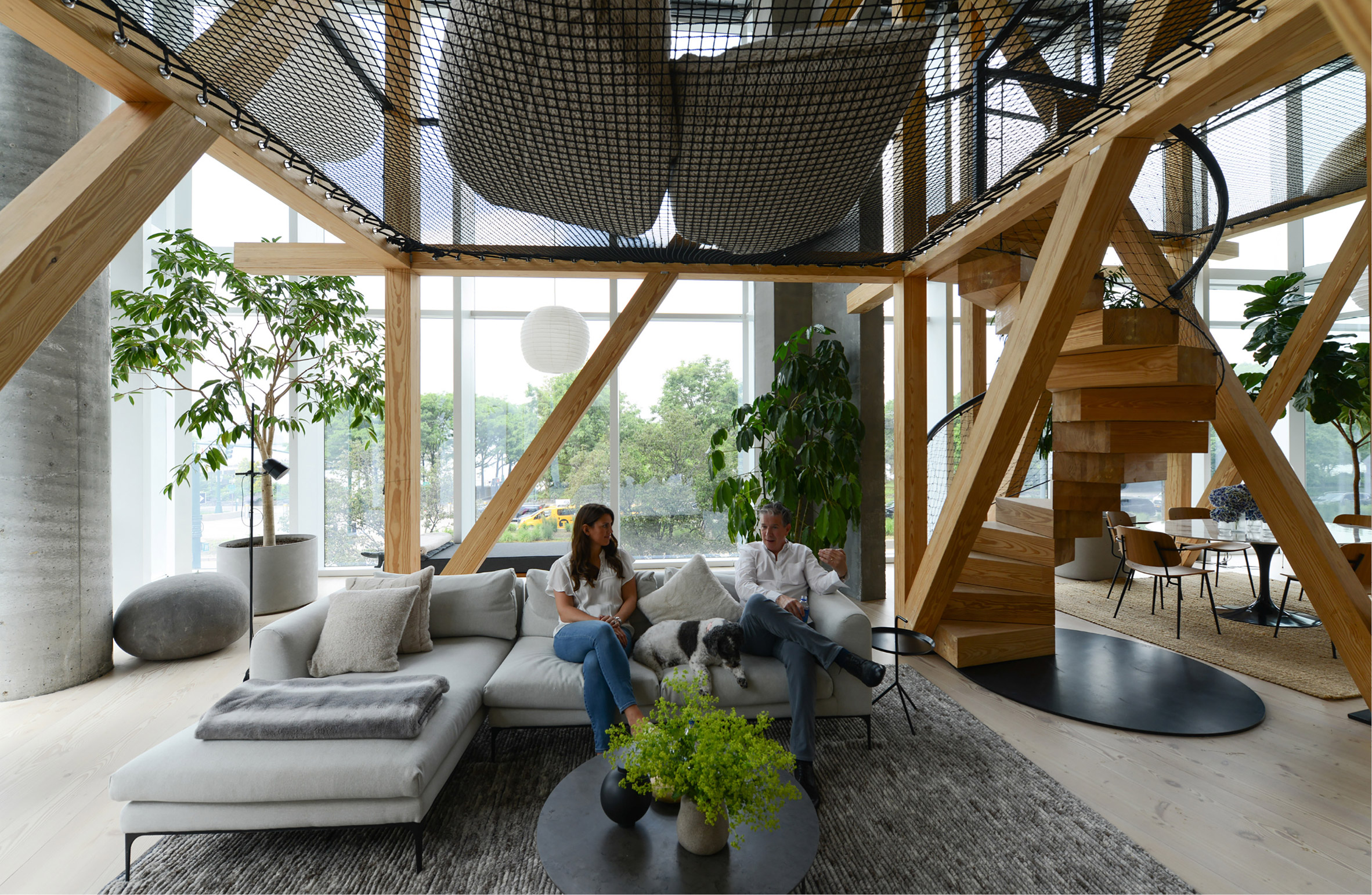 Net hammocks suspended above seating areas