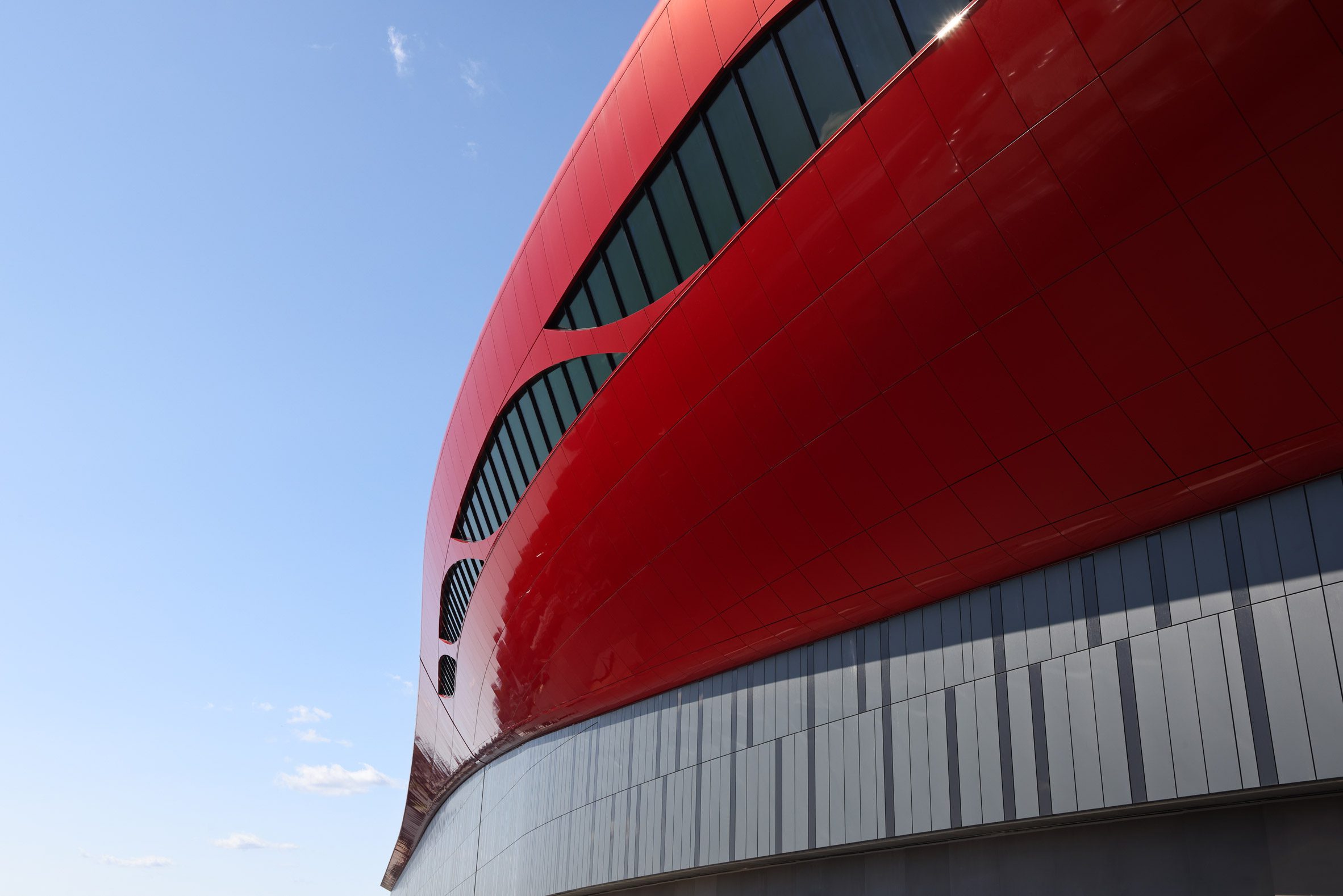 Windows on the red facade of Boston Airport