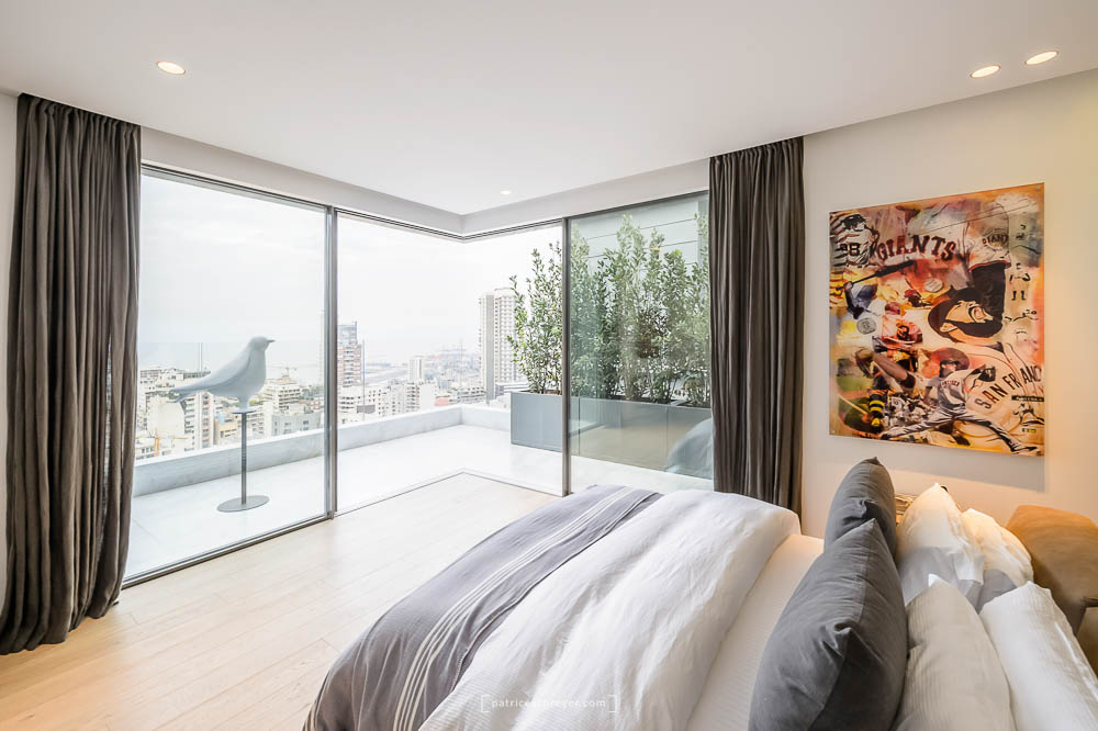 20I30 Penthouse by Raed Abillama Architects, Beirut, Lebanon, featuring Vitrocsa glass windows