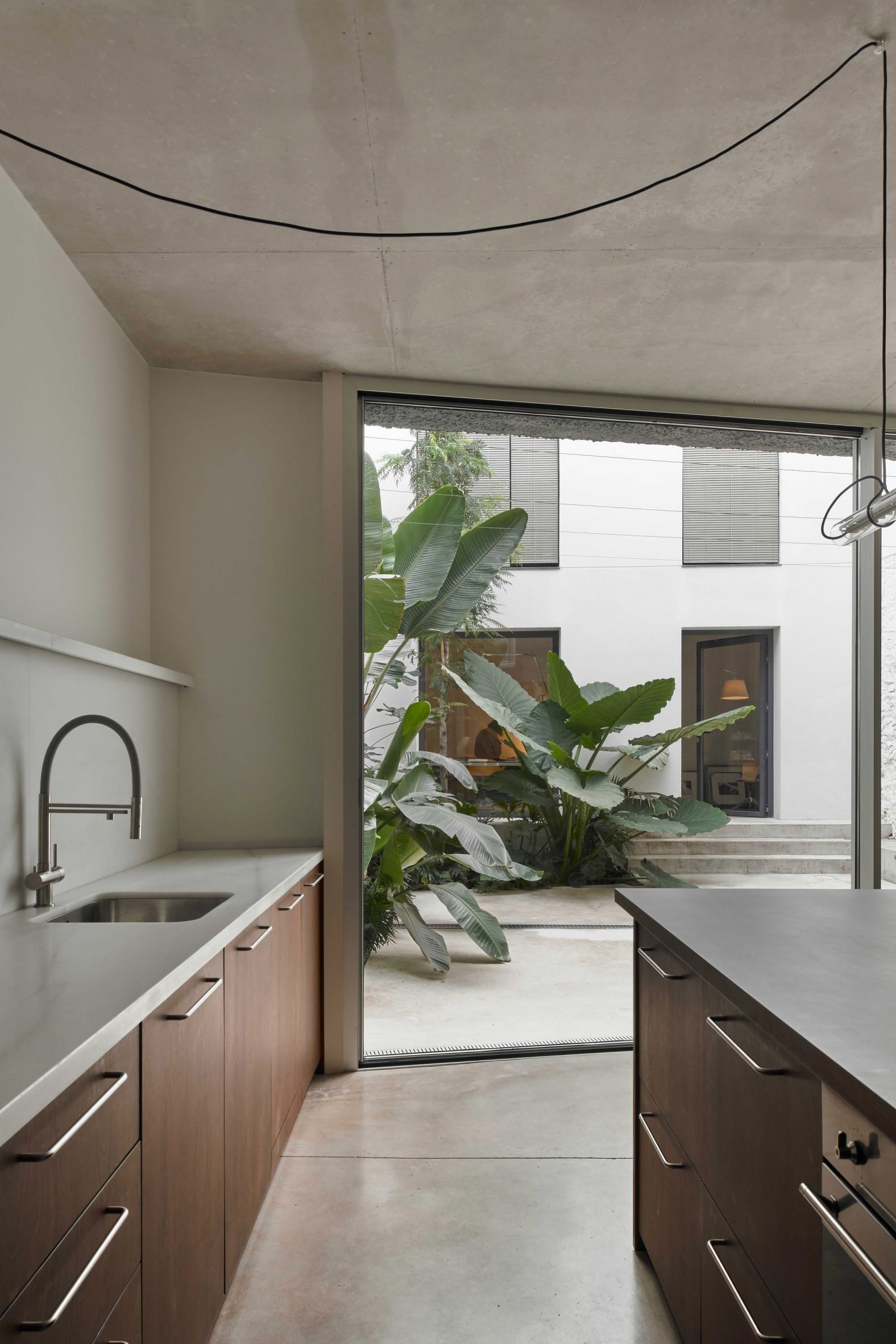 Kitchen looking out at patio of Bolívar House