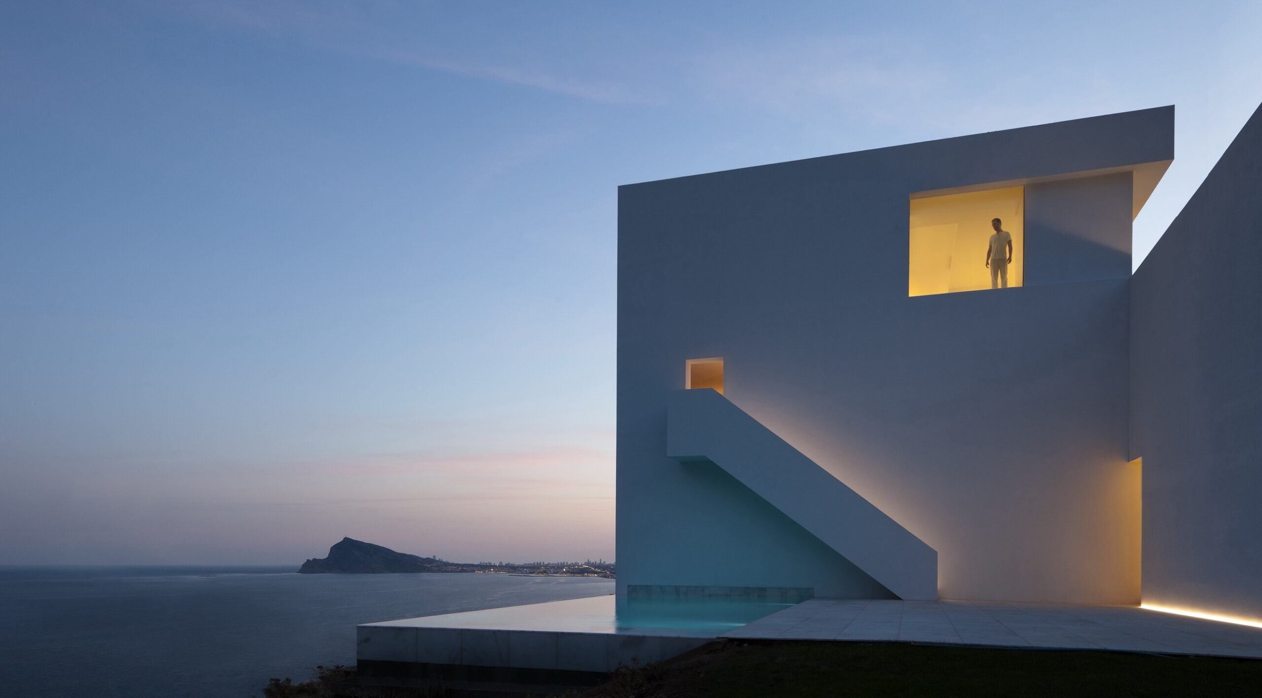 House on Cliffside by Fran Silvestre Arquitectos, Spain, featuring Vitrocsa glass windows