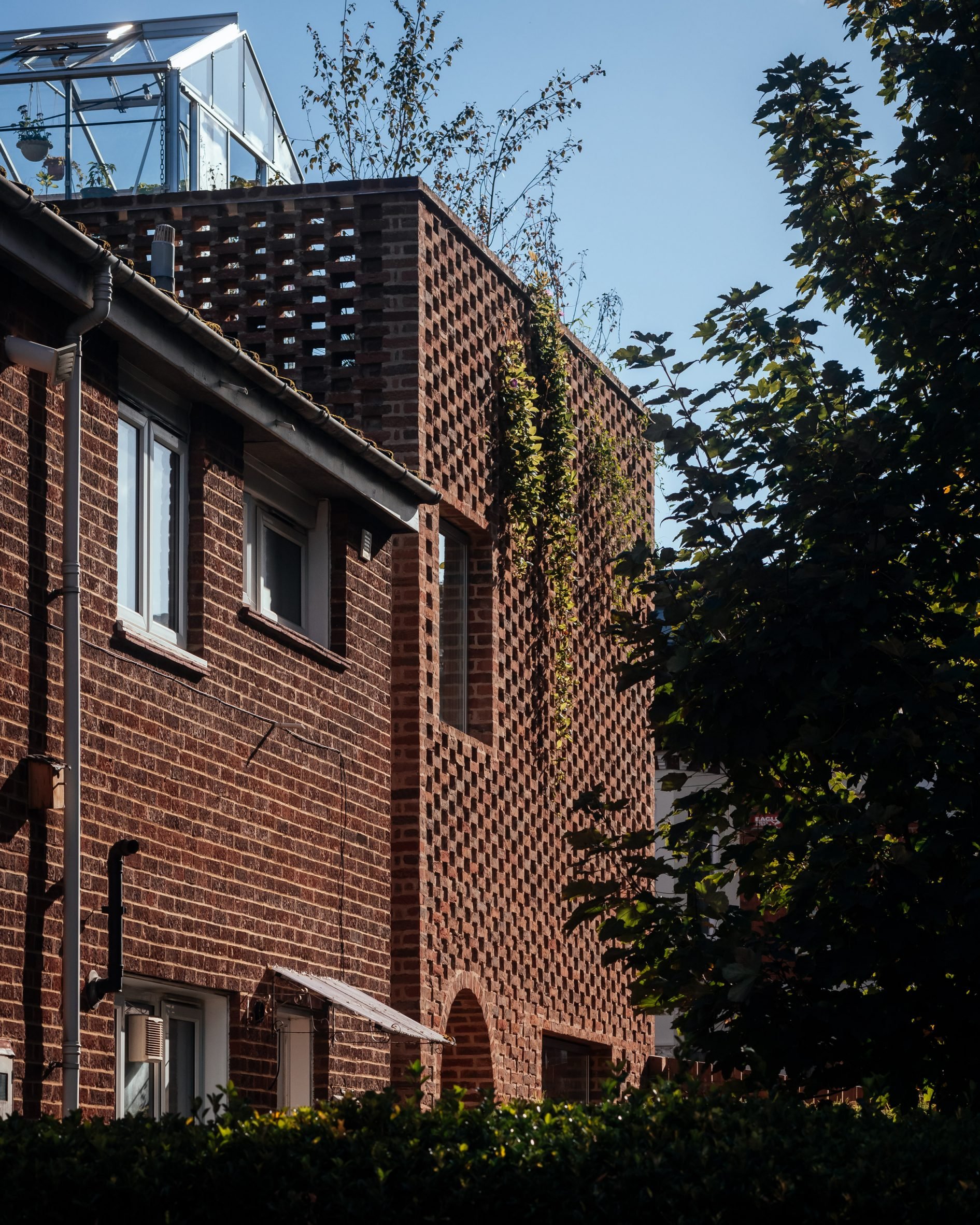 Side view of home with hit-and-miss brickwork