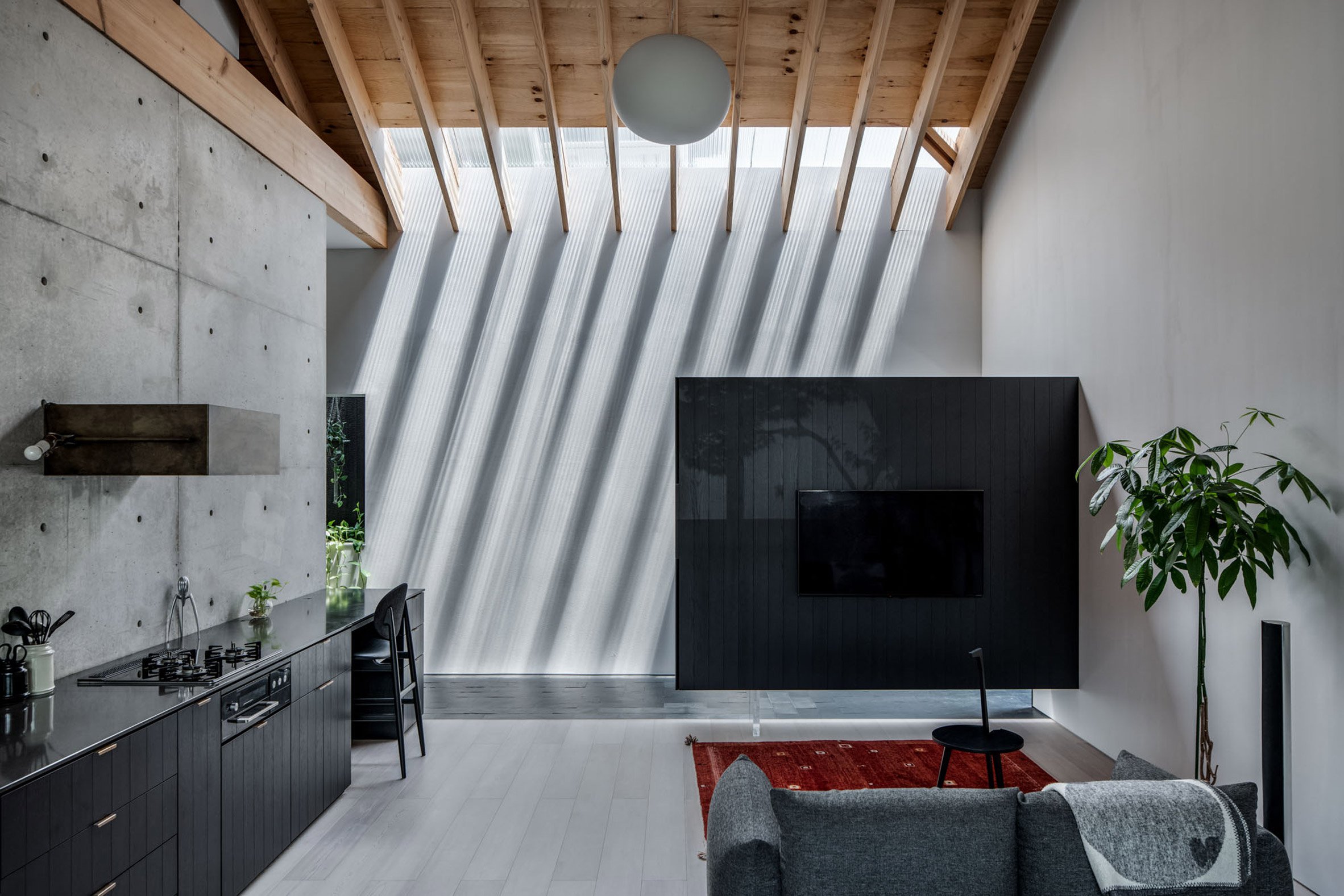 Living area of Japanese home by Slow