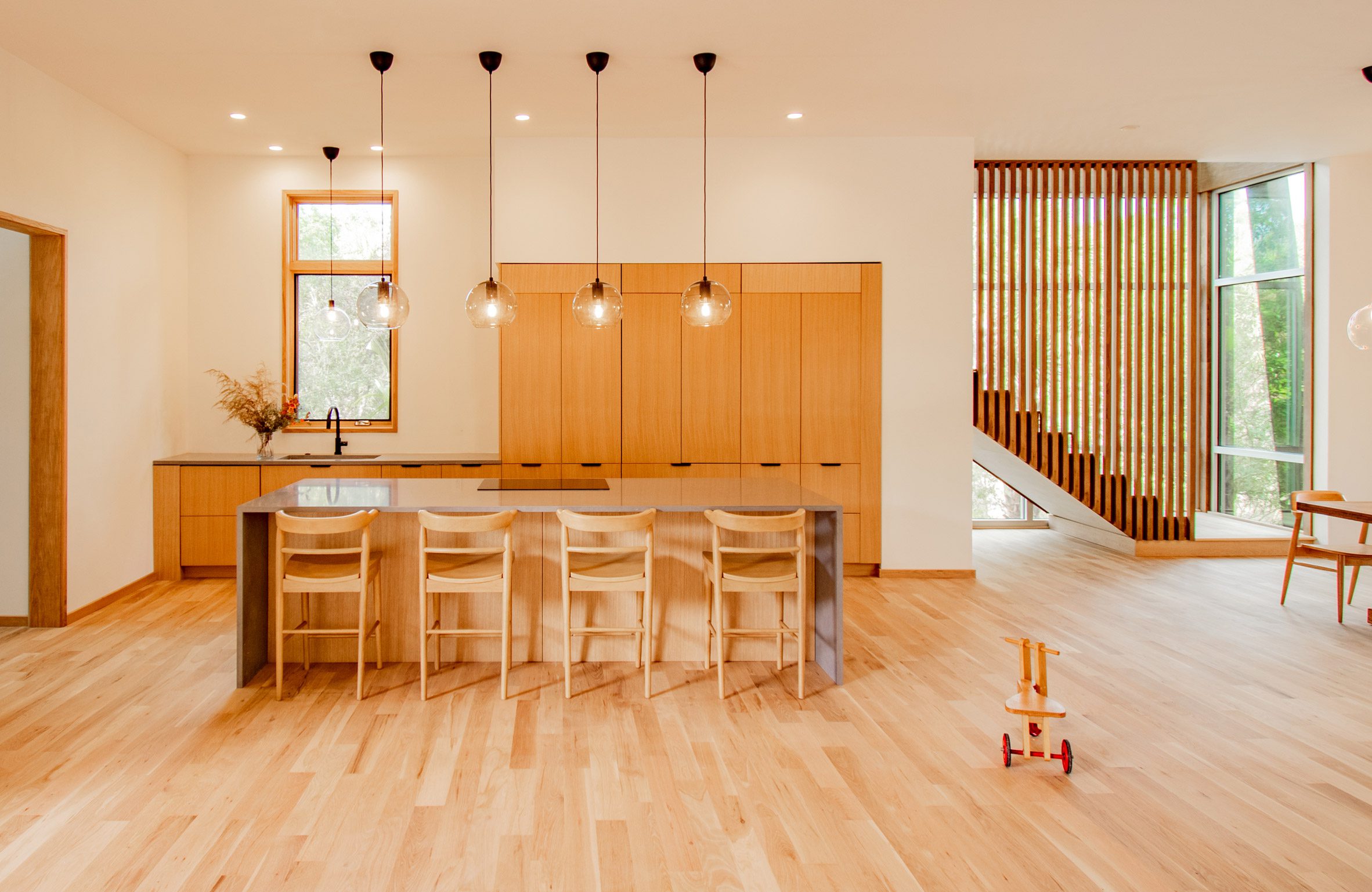 A wooden kitchen and staircase
