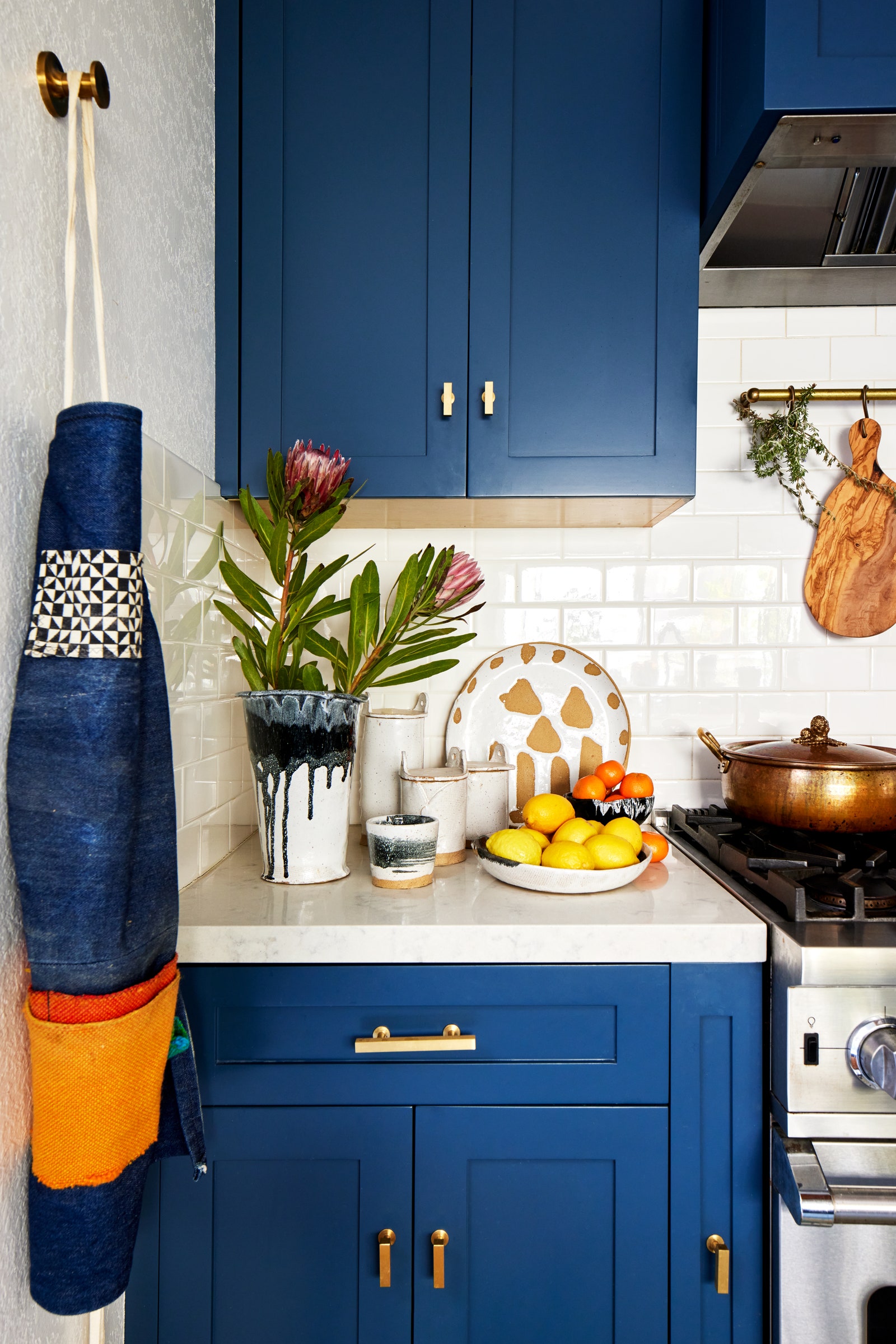 Image may contain Indoors Interior Design Cooktop Kitchen Clothing Hosiery Sock Cookware Pot and Cup