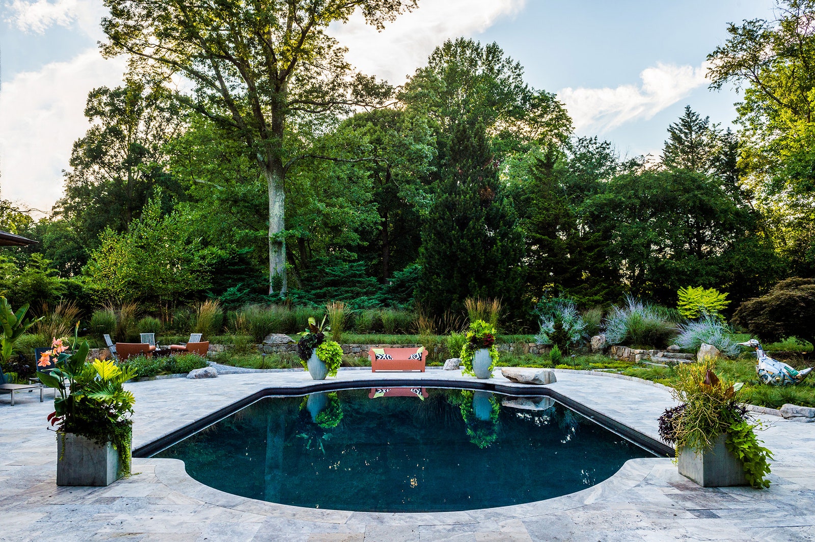 Image may contain Backyard Nature Outdoors Yard Pool Water Swimming Pool Garden Plant Tub and Vegetation