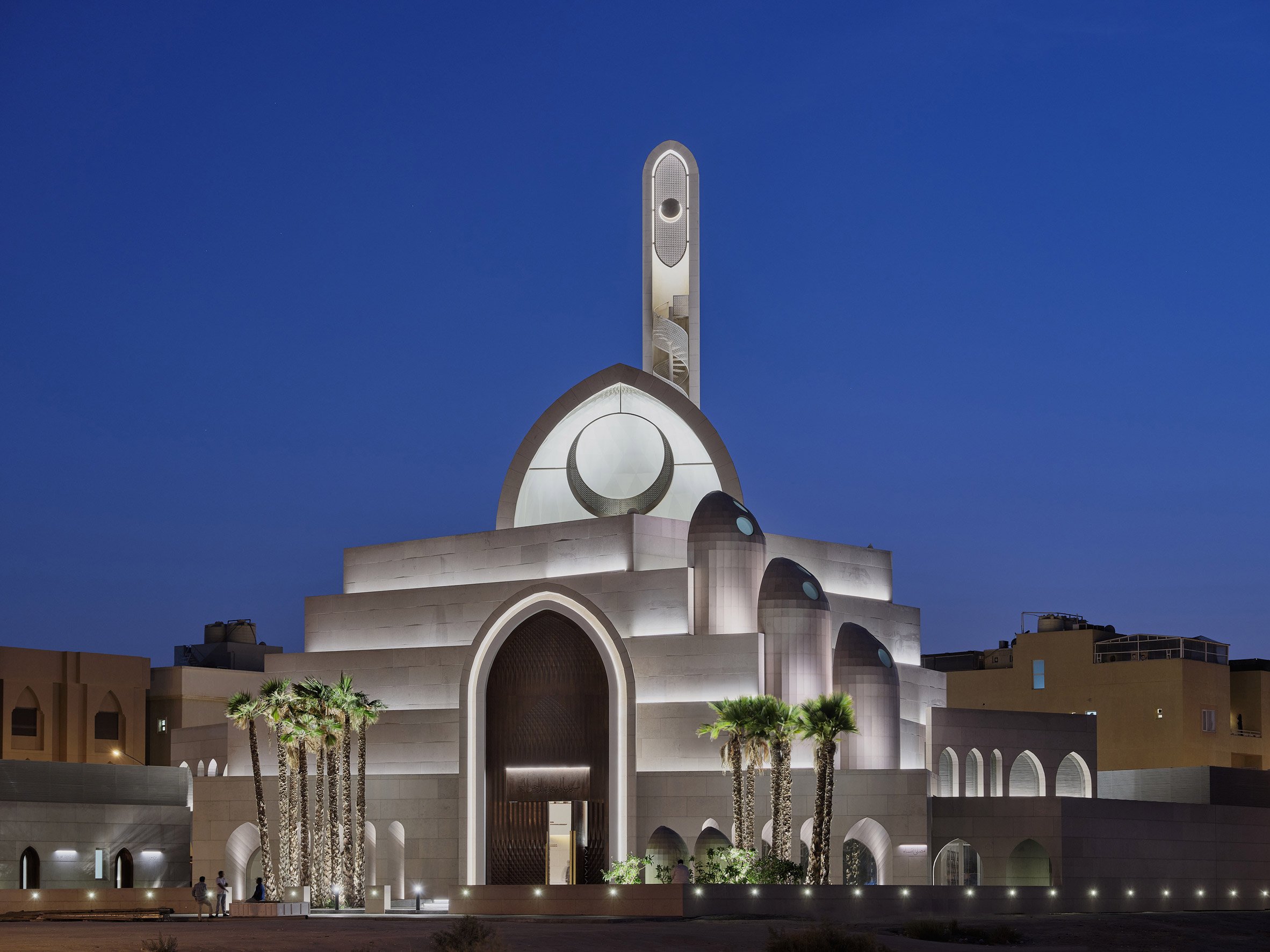The building exudes a celestial ambiance with its exterior lighting