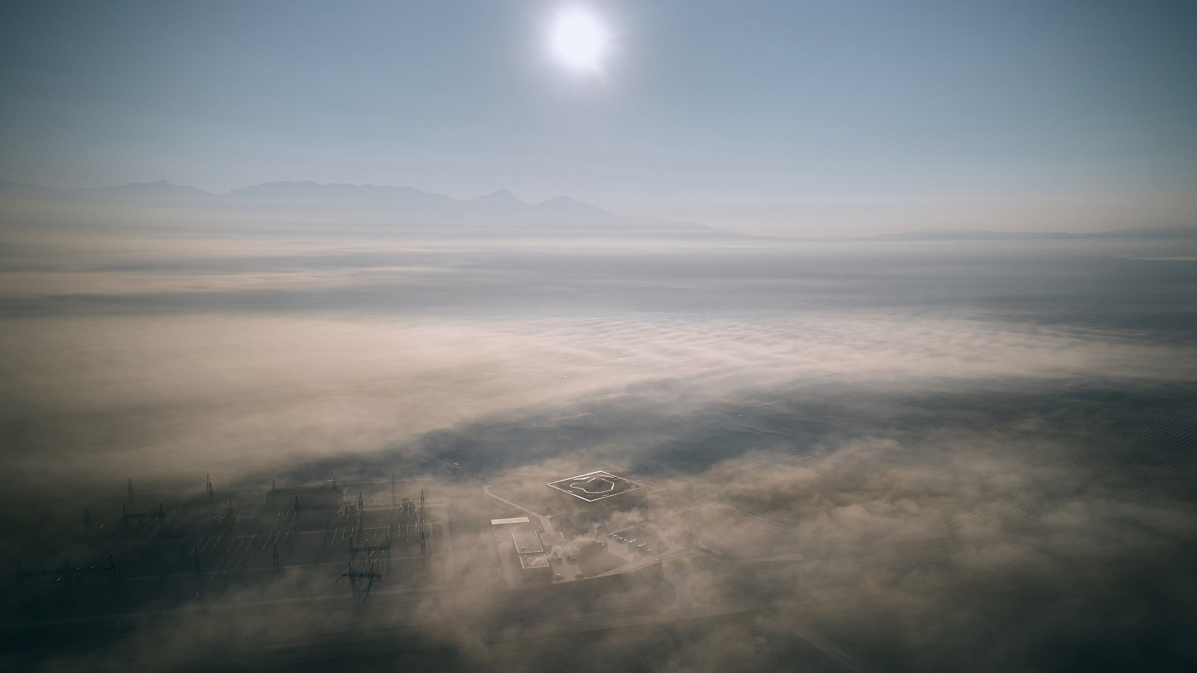 Aerial view of Central Control Building by Bilgin Architects when sky is overcast