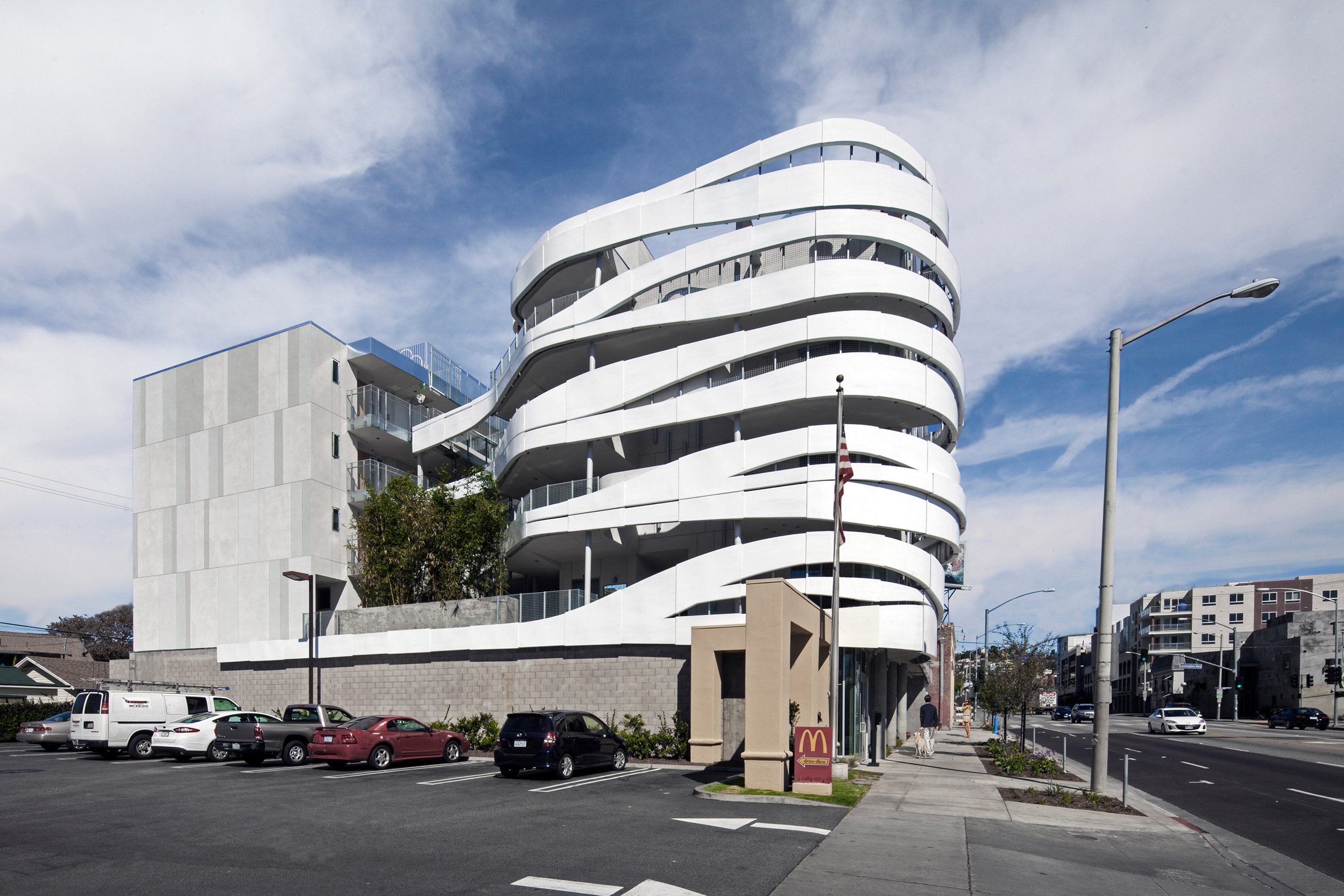 Building with white ribbons on side 