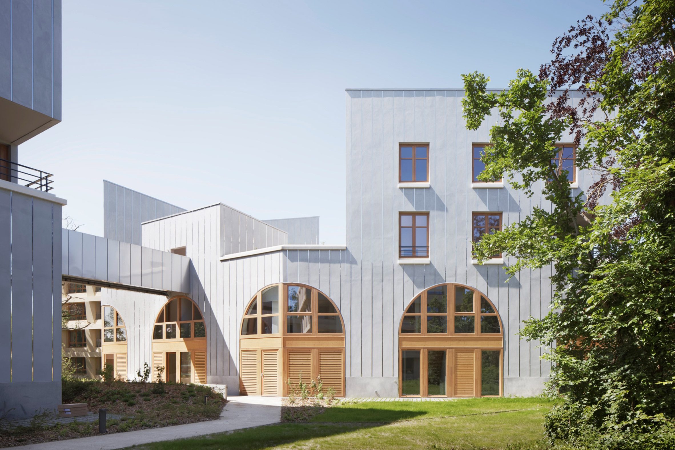 Walkway through Parc Princesse social housing by SOA Architectes
