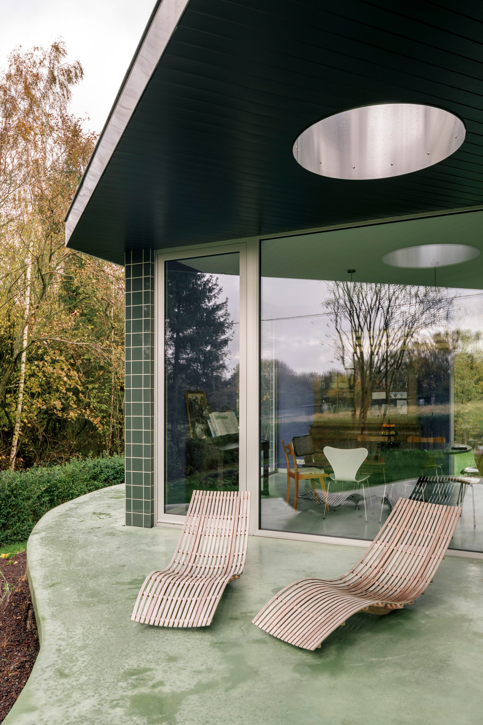 Extension on a green concrete platform