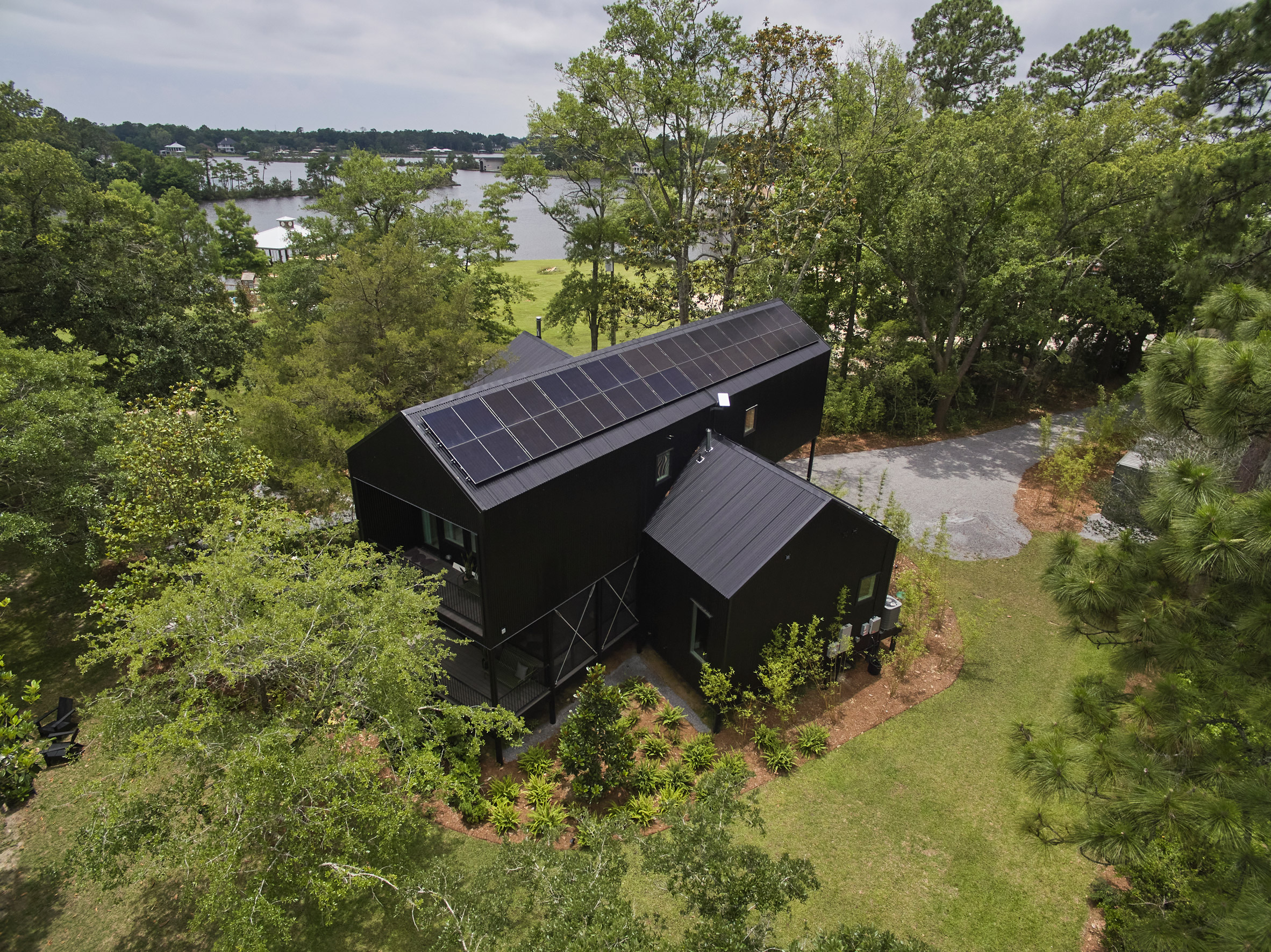 X-shaped home by Tall Architects