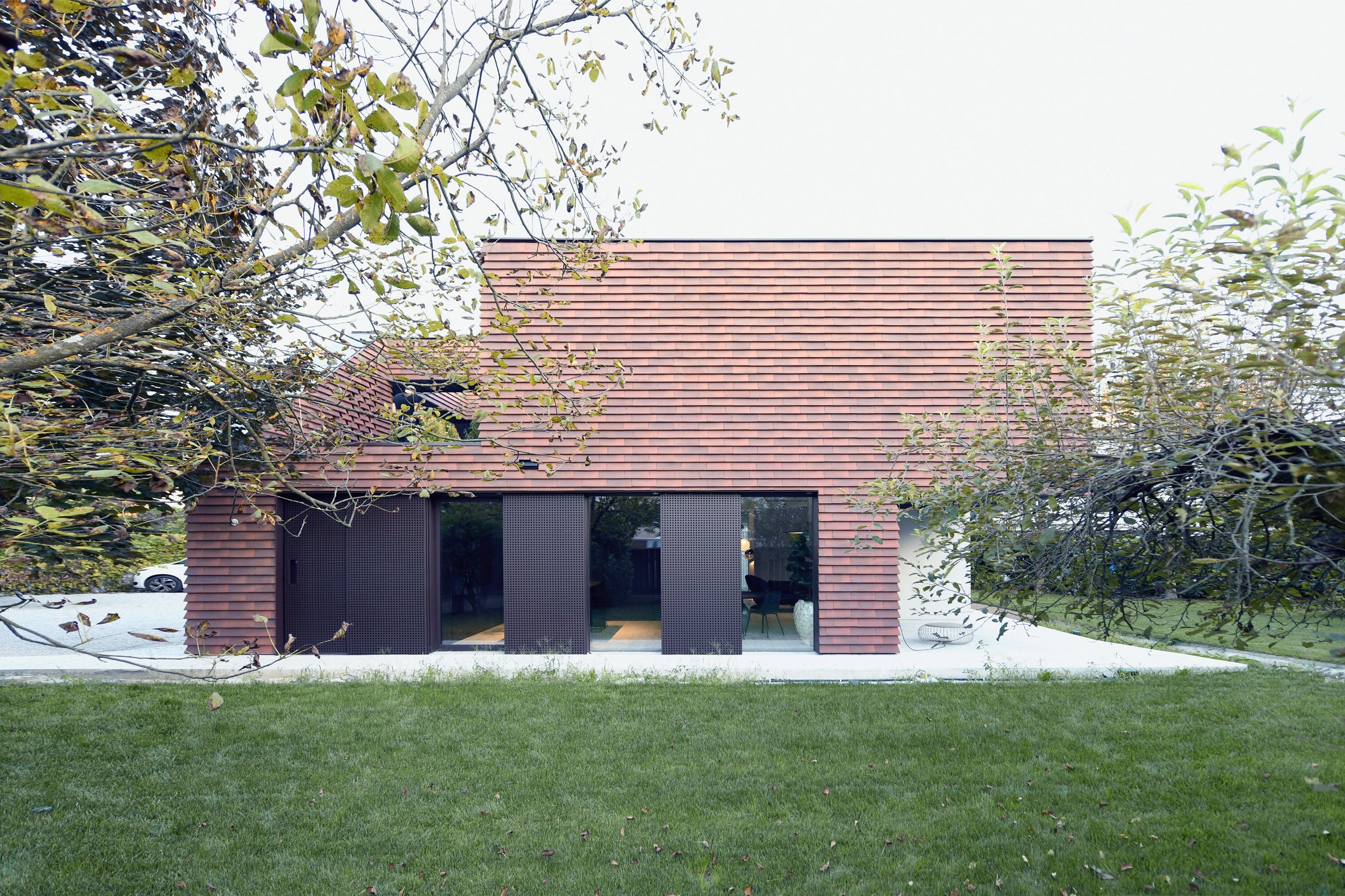 Exterior view of family home by OFIS Arhitekti