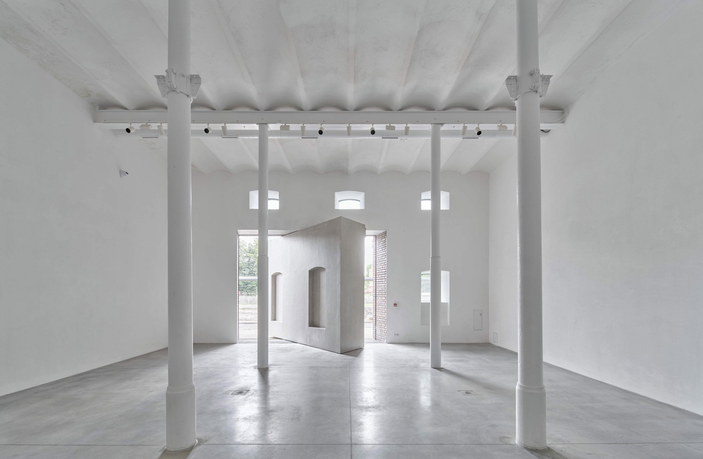 White art gallery with a rotating wall