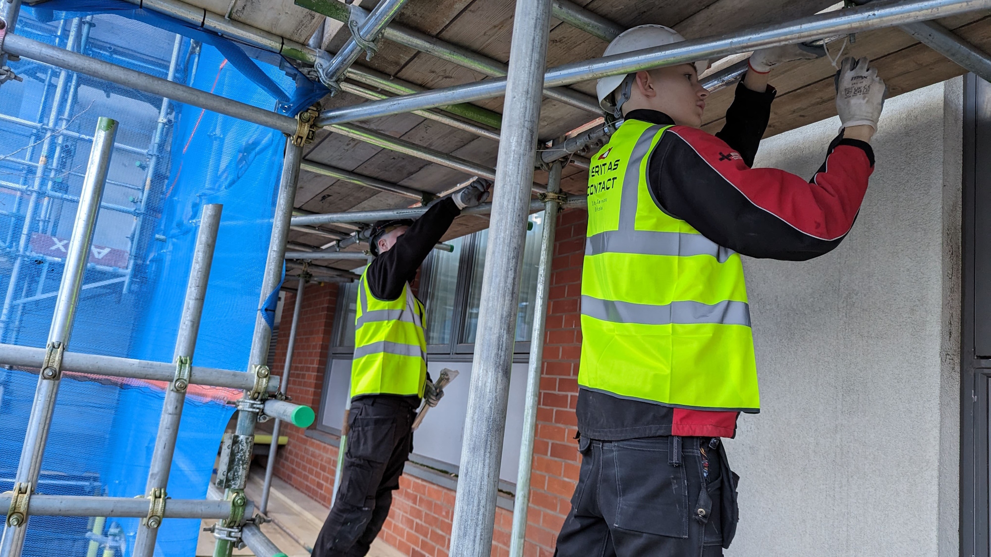 Contractor Veritas installing the linear fire detection system on a cladding remediation project (image: Veritas).