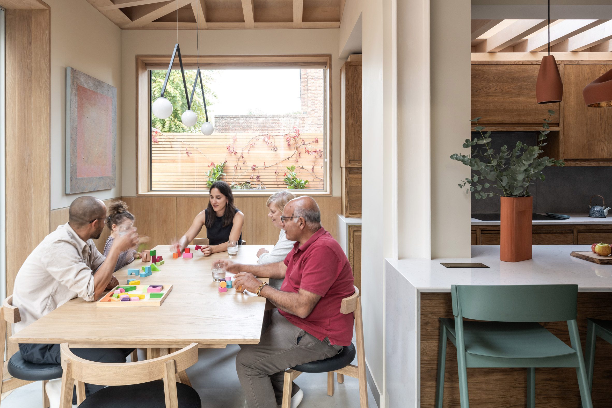 Wood-lined dining room of Norwich home